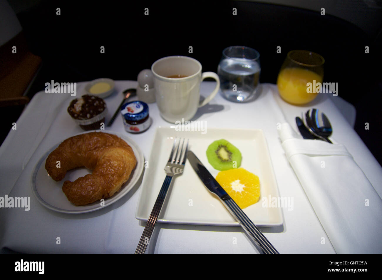 SINGAPORE JULY 22, 2016 breakfast on an airplane in Business Class