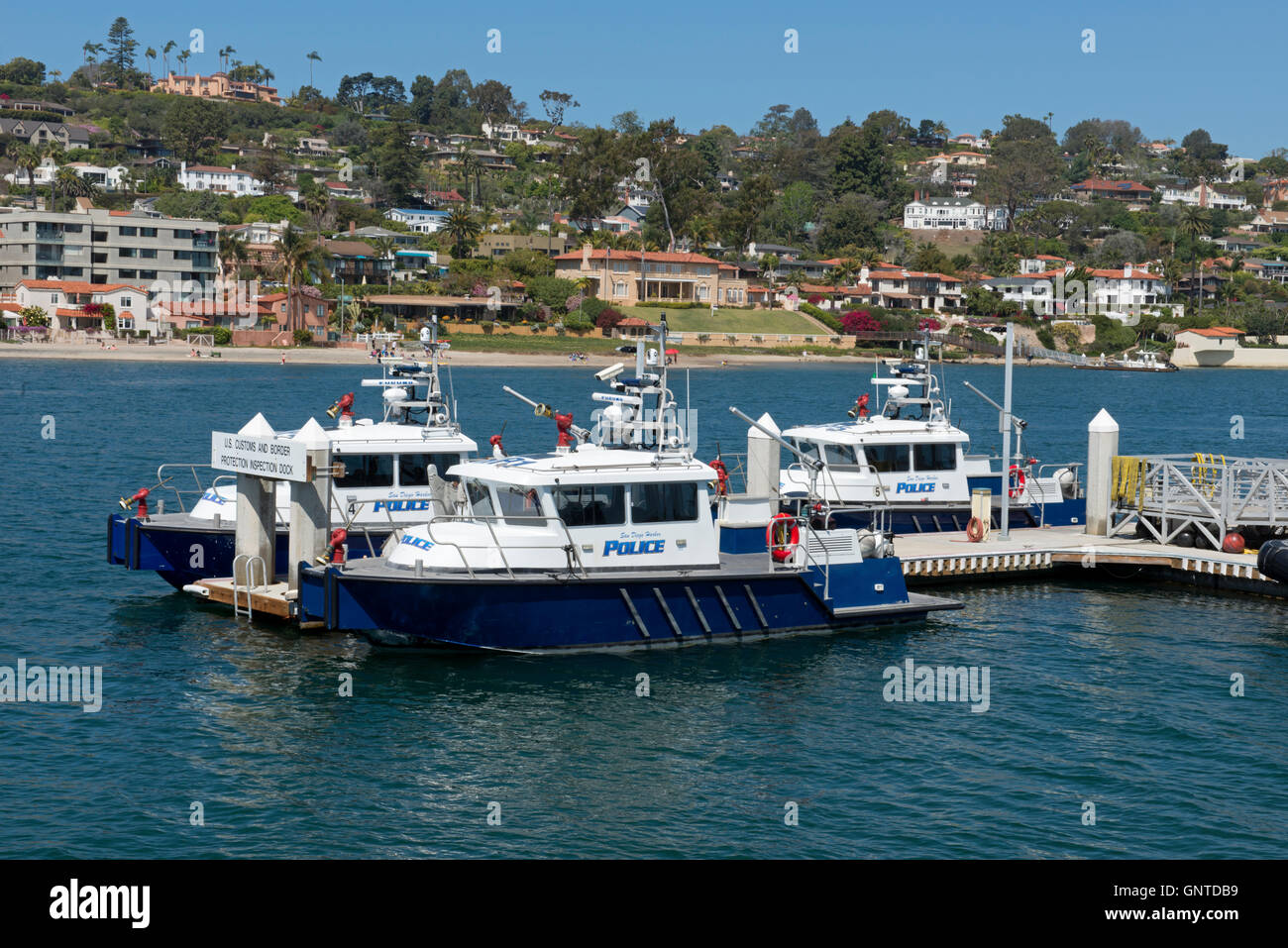 San Diego Harbor Police Boat Dock, Shelter Island (Point Loma in Background), San Diego Bay, San Diego, California Stock Photo