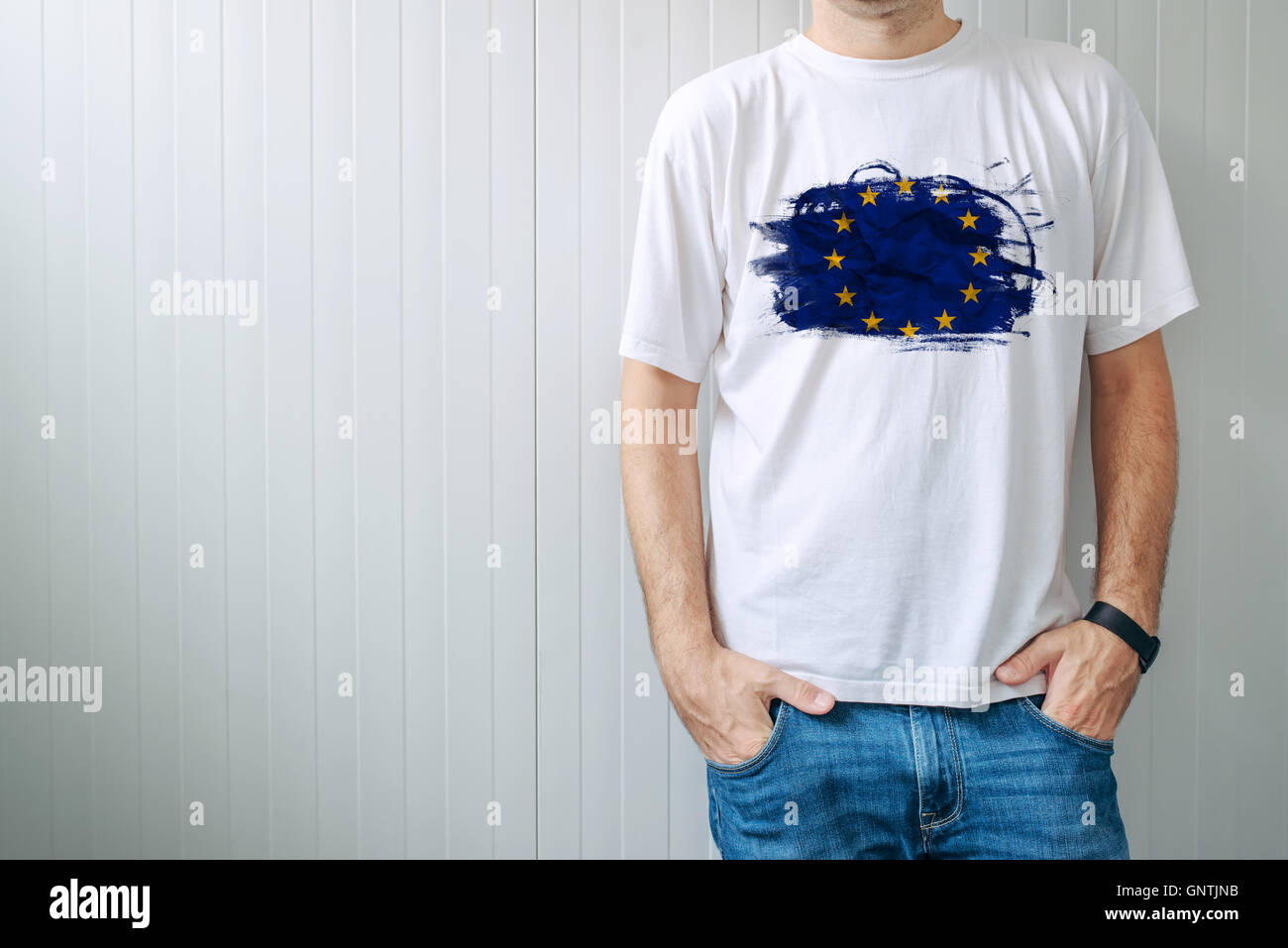 Man wearing white shirt with EU flag print, adult male person supporting European Union Stock Photo