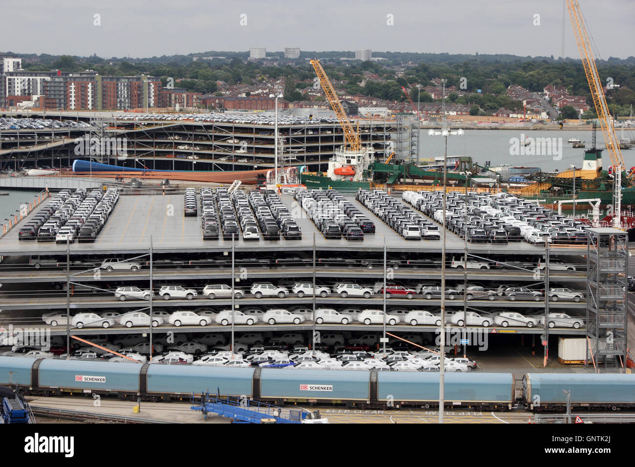 Jaguar and Land Rover 4 x 4 vehicles in multi strorey car park awaiting export from Southampton docks Stock Photo
