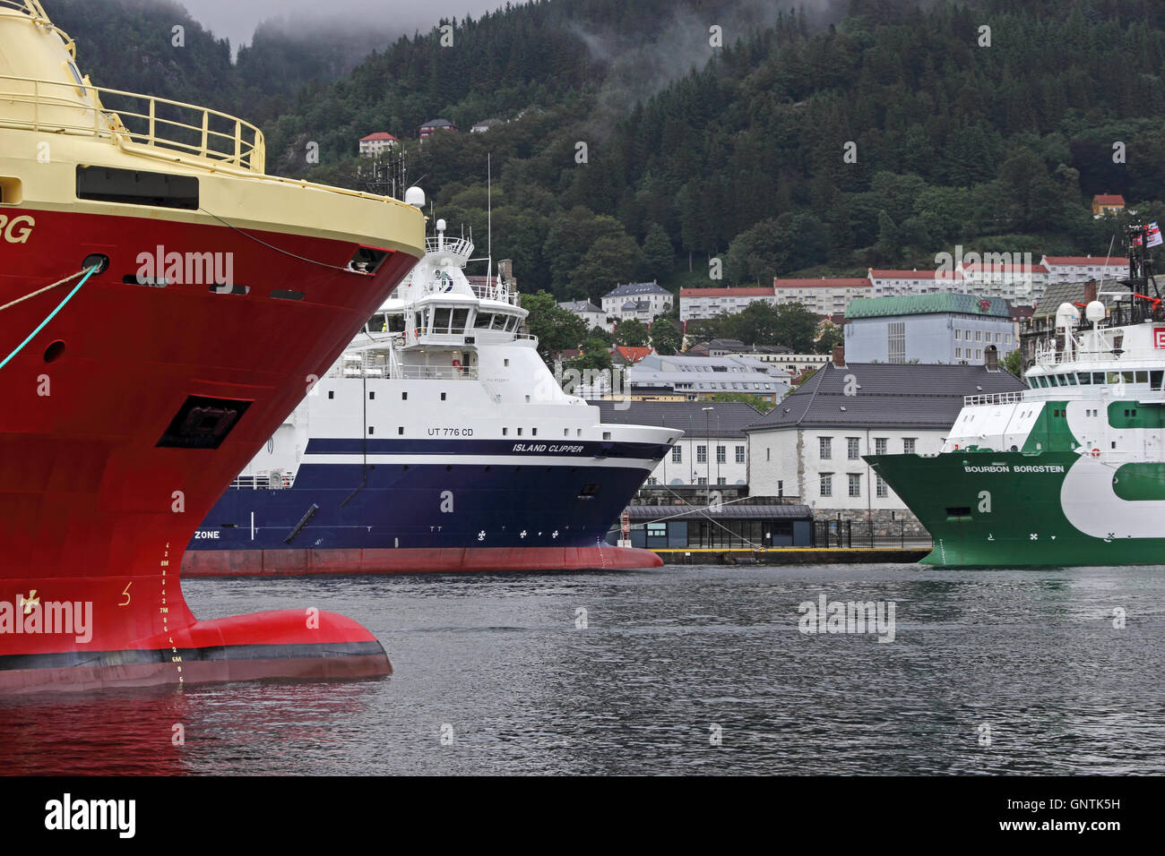 Off-shore support vessels moored in harbour, Bergen, Norway Stock Photo