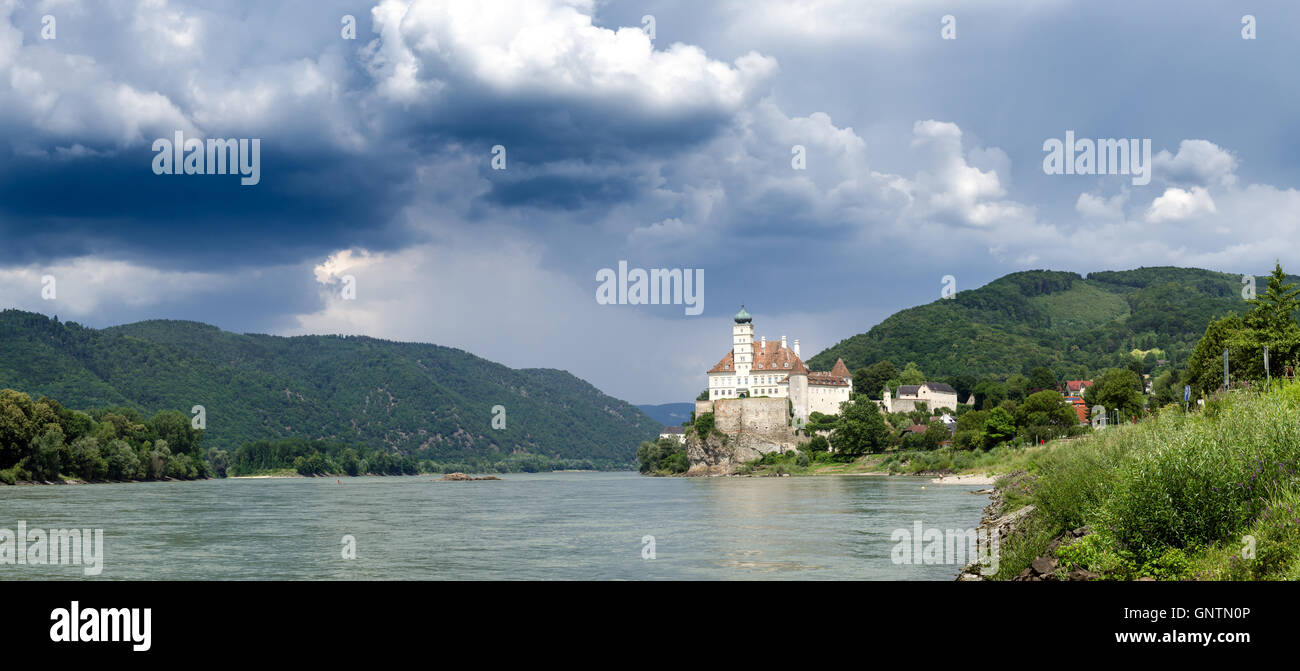 Panorama of Schonbuhel Castle as a storm rolls over, along the Danube River in Wachau Valley, Austria Stock Photo