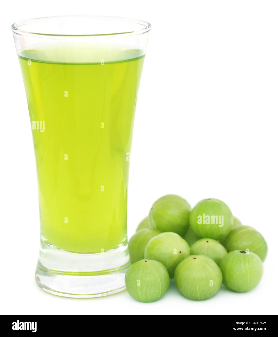 Herbal amla juice with fresh fruits over white background Stock Photo