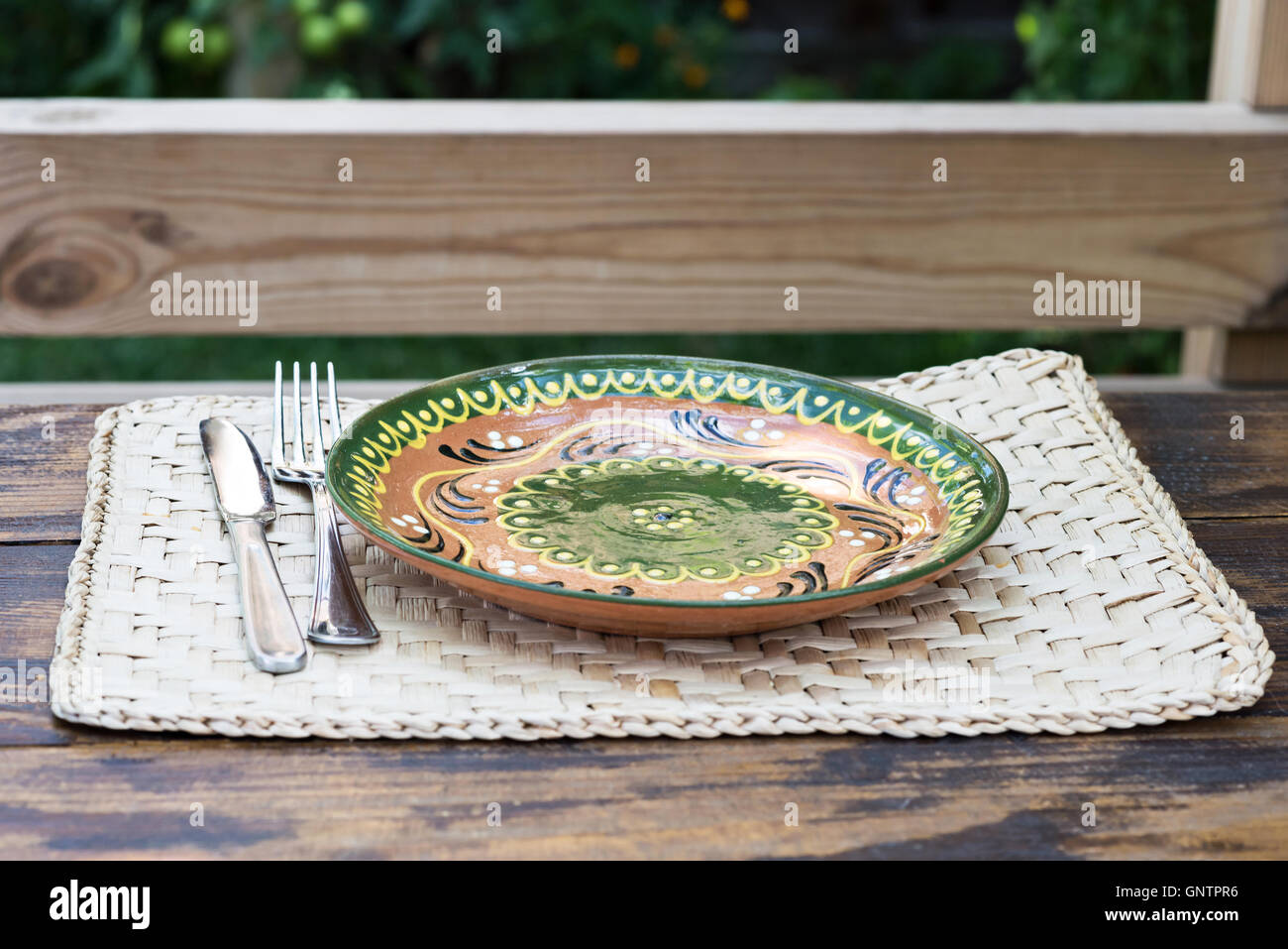 Traditional plate with ornaments on a restaurant table in Moldova Stock Photo