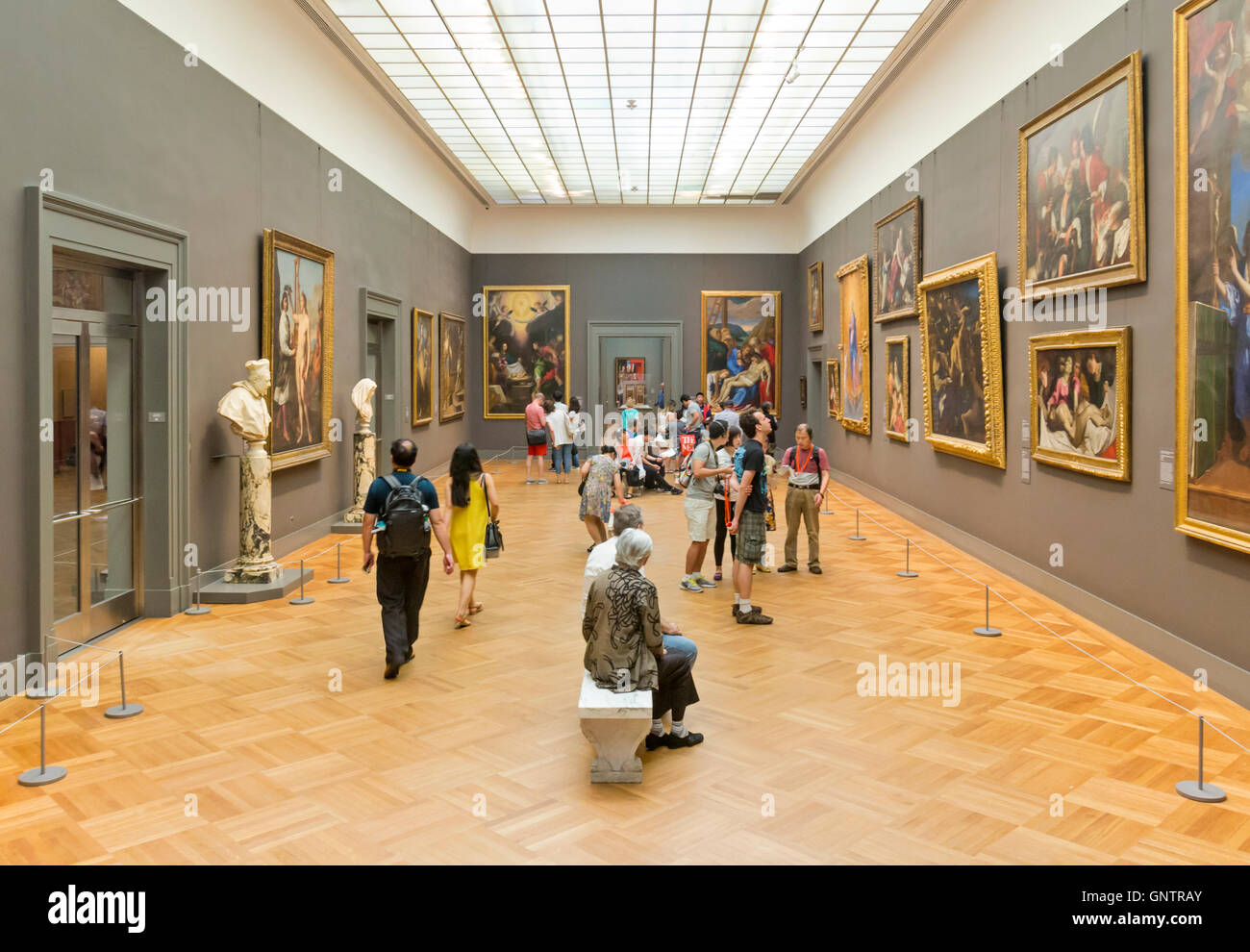 Visitors viewing artwork in the MOMA - the Metropolitan Museum of Art, Manhattan, New York City. Stock Photo