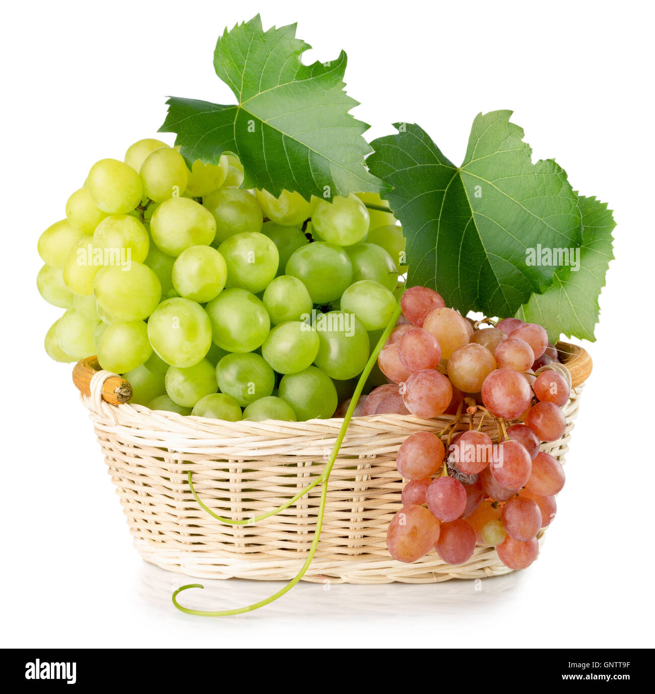 green and pink grapes in basket isolated on the white background Stock ...