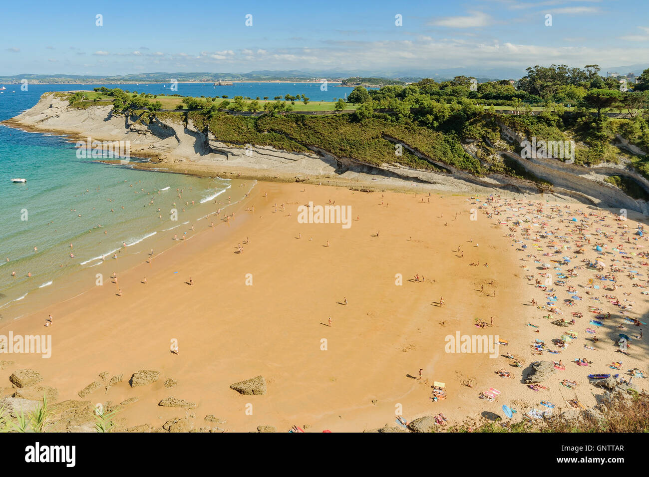 Rocky promontory used as a golf course and Mataleñas beach in Santander, Cantabria, northern Spain Stock Photo