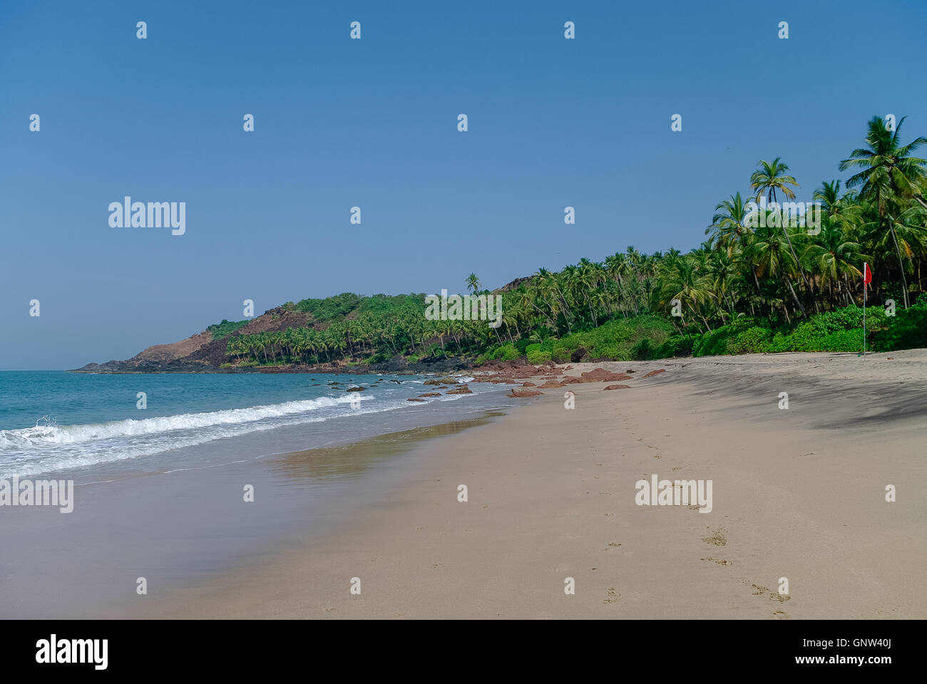 Sea view from hidden beach with palms near Agonda beach, Goa state, India Stock Photo