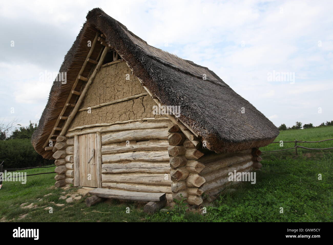Replica of a house from the bronze age at the archaeological site in Nizna Mysla, Slovakia. Stock Photo