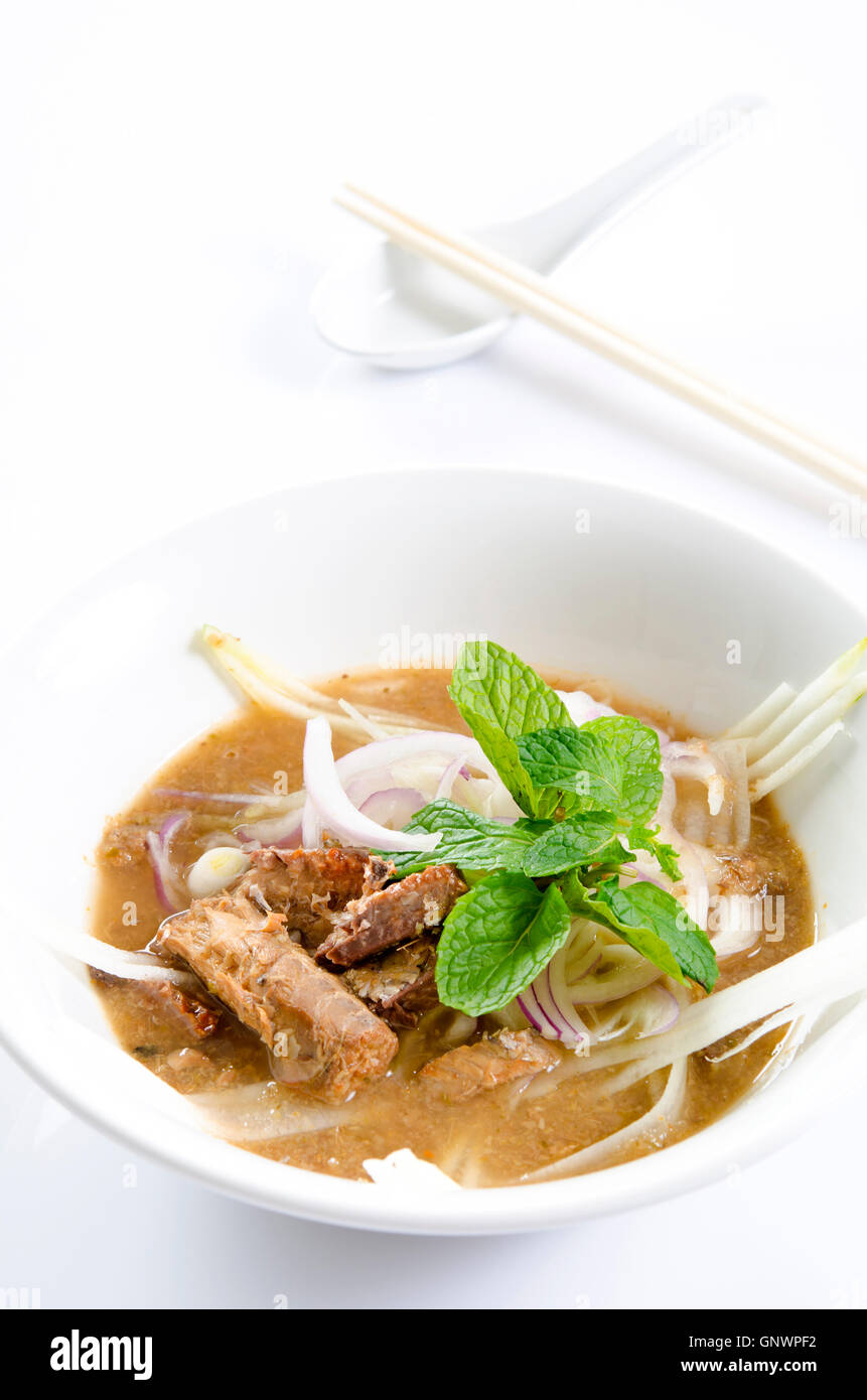malaysian famous assam laksa isolated in white Stock Photo