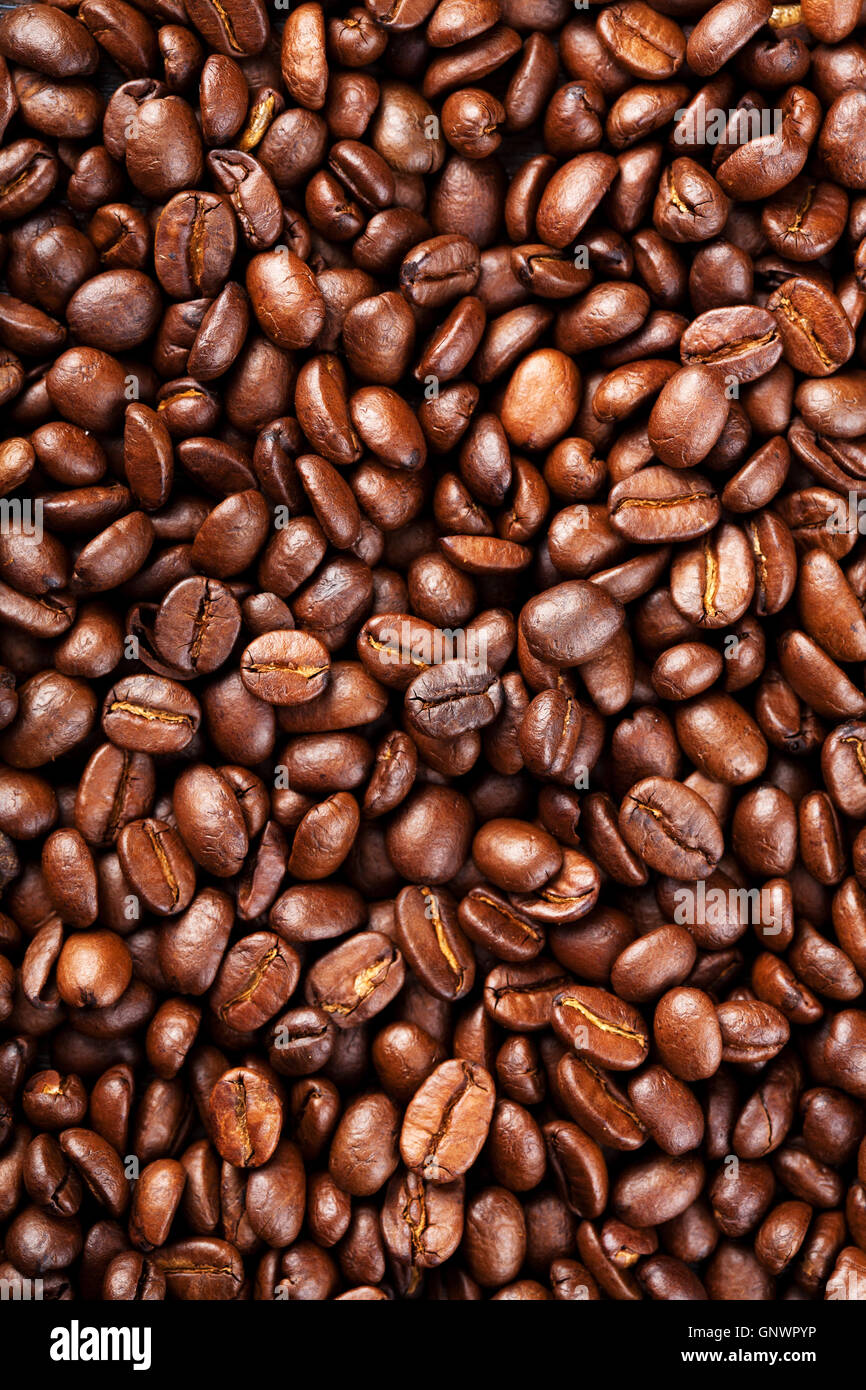 roasted coffee beans background Stock Photo - Alamy