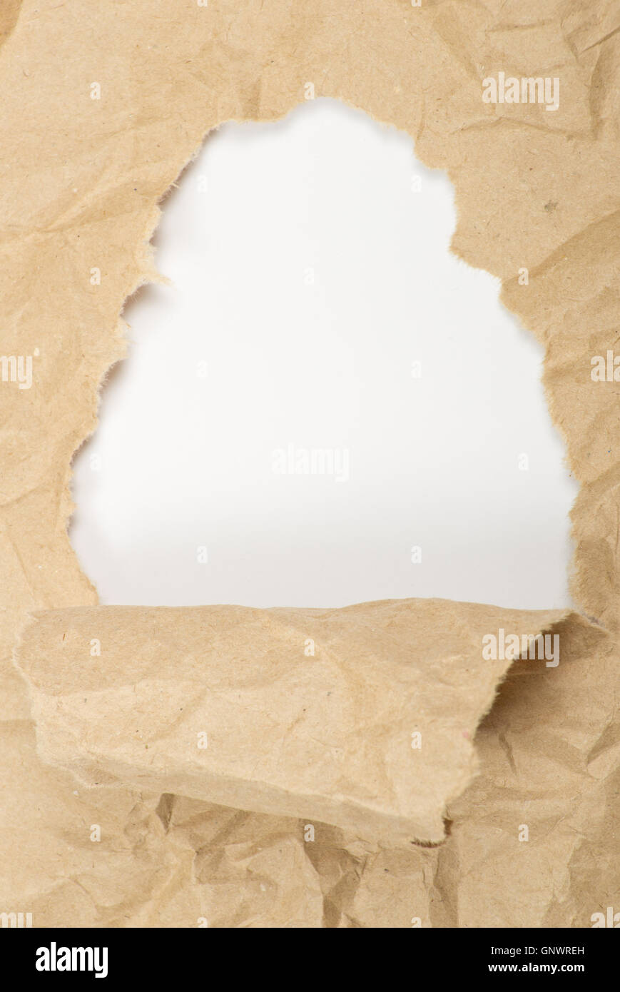 ripped white paper against a white background Stock Photo - Alamy