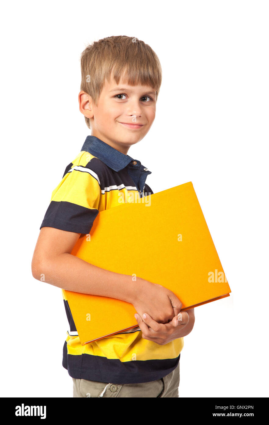 School boy is holding a book Stock Photo - Alamy