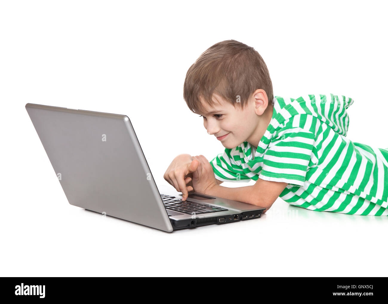 Boy holding a laptop Stock Photo
