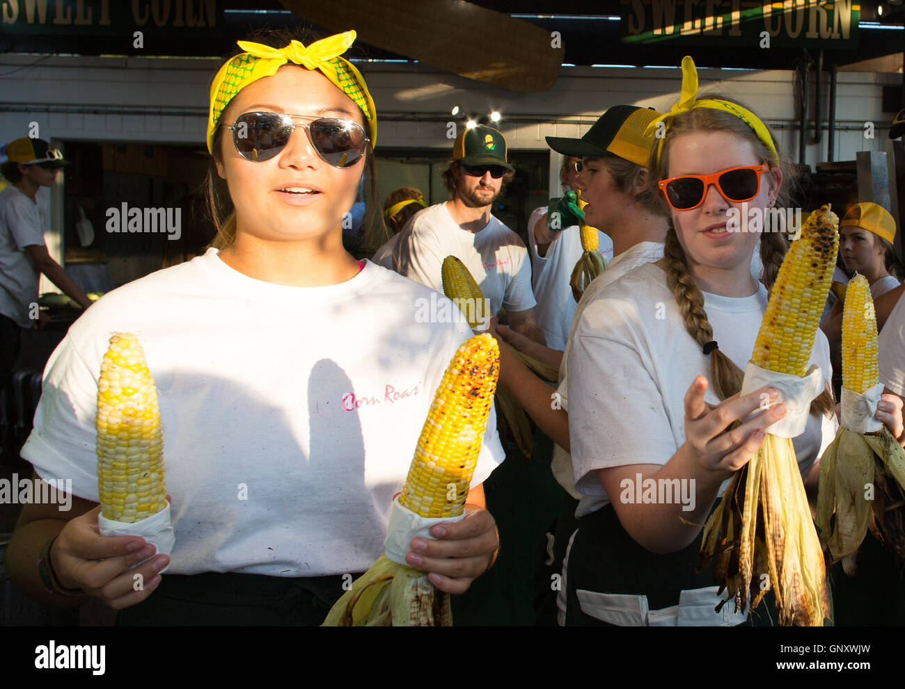 St. Paul, Minnesota, USA. 31st August, 2016. Young women serving roasted corn at the Minnesota State Fair. © Gina Kelly / Alamy Live News Stock Photo