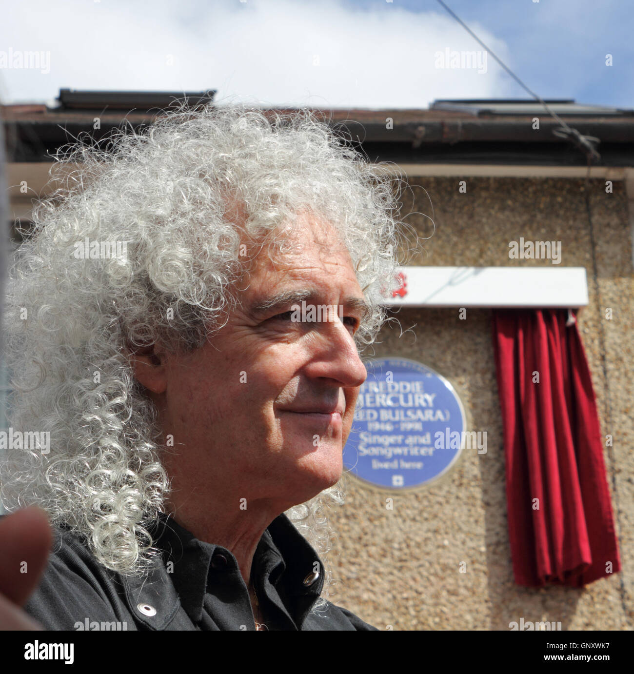 Feltham, London, England, UK. 1st September 2016.  Brian May from rock group Queen unveiled an English Heritage Blue Plaque for the former lead singer Freddie Mercury. On what would have been Freddie's 70th birthday the Blue Plaque showing his birth name Fred Bulsara was unveiled on his former home at Feltham in West London, where he lived with his family in the 1970's. Credit:  Julia Gavin UK/Alamy Live News Stock Photo