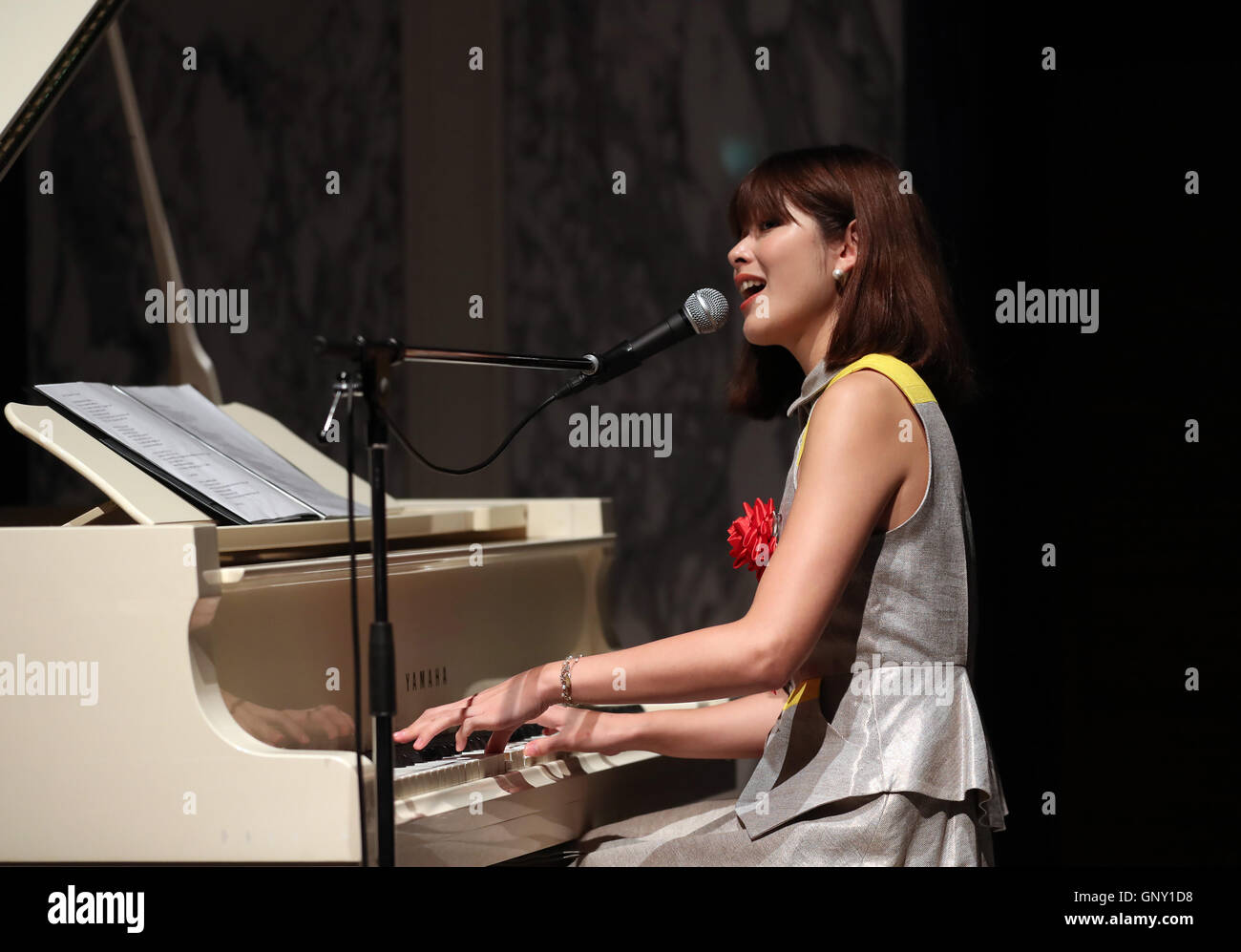Tokyo, Japan. 1st Sep, 2016. Japanese singer-songwriter Kaori Sawada sings  her song and plays piano at the opening ceremony for the Australian food  and wine fair in Tokyo on Thursday, September 1,