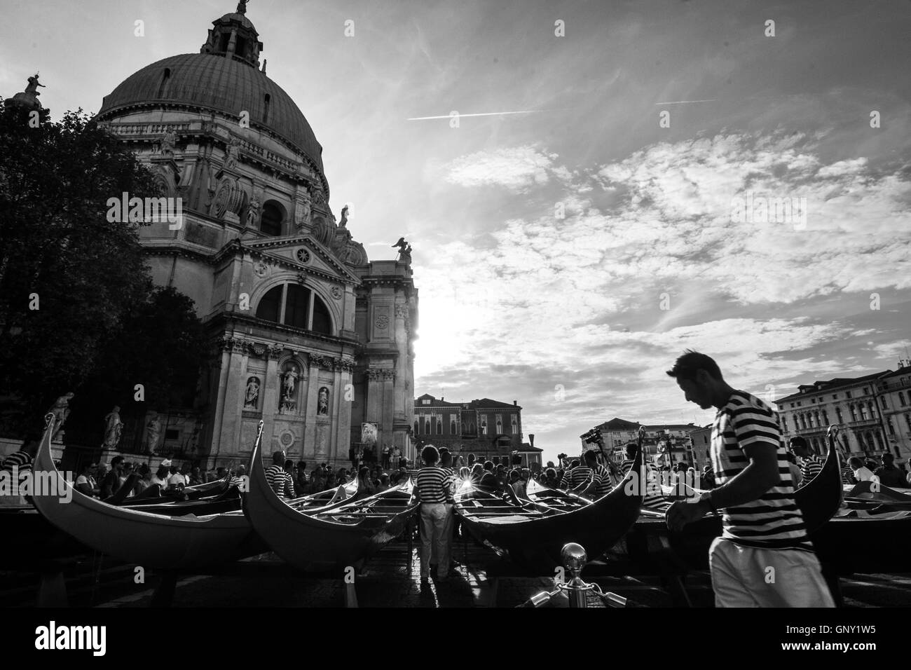 Venice, Italy. 1st september, 2016.  (EDITOR NOTE: this image has been converted in black and white) The Gondolini and the 'Regatanti' (rowers) gather for the blessing at Santa Maria della Salute church ahead of Sunday Historic Regata.The Historic Regata is the most exciting boat race on the Gran Canal for the locals and one of the most spectacular. © Simone Padovani / Awakening / Alamy Live News Stock Photo