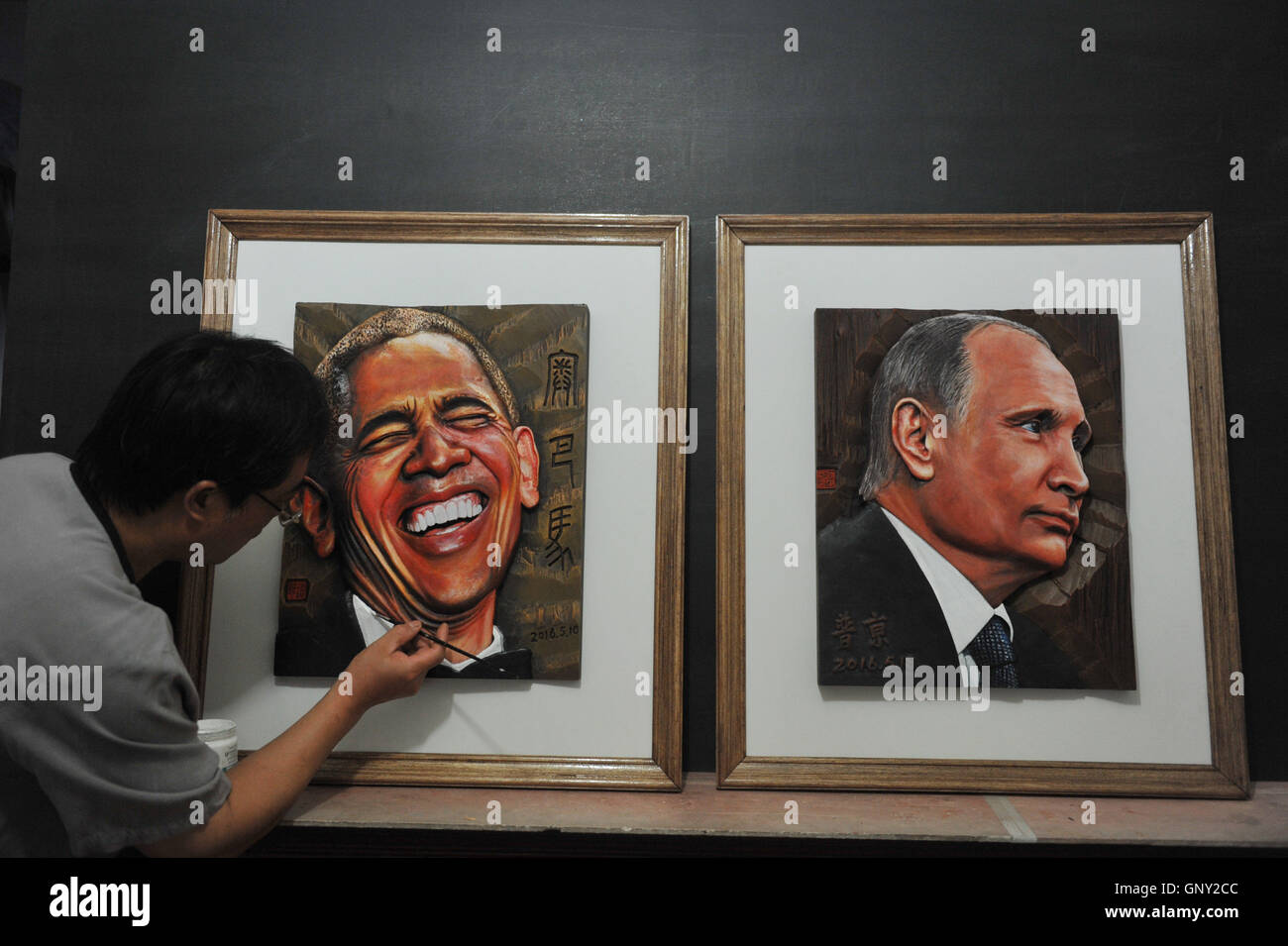 Hangzhou, Hangzhou, China. 2nd Sep, 2016. Hangzhou, CHINA- September 2 2016: (EDITORIAL USE ONLY. CHINA OUT) Xu Leping, a carving artist, makes wooden portraits of leaders of G20 members in Hangzhou, capital of east ChinaÂ¡Â¯s Zhejiang Province, celebrating the upcoming 2016 Hangzhou G20 Summit. Xu spends about two weeks making the wooden portraits of G20 membersÂ¡Â¯ leaders including Xi Jinping, Barack Obama and Vladimir Putin. Credit:  SIPA Asia/ZUMA Wire/Alamy Live News Stock Photo