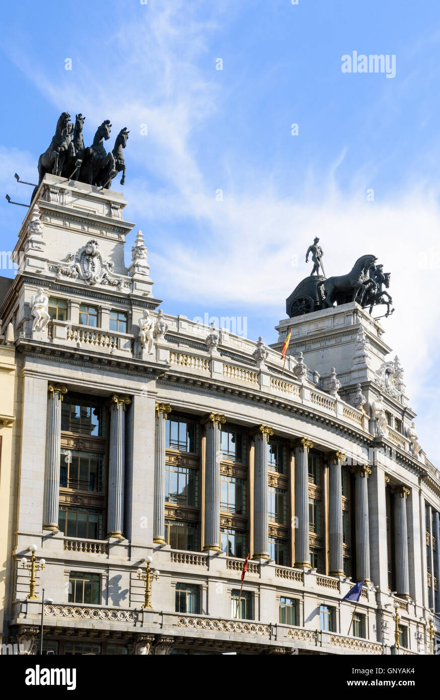 Four horse chariot sculpture on top of the BBVA building in Madrid, Spain Stock Photo