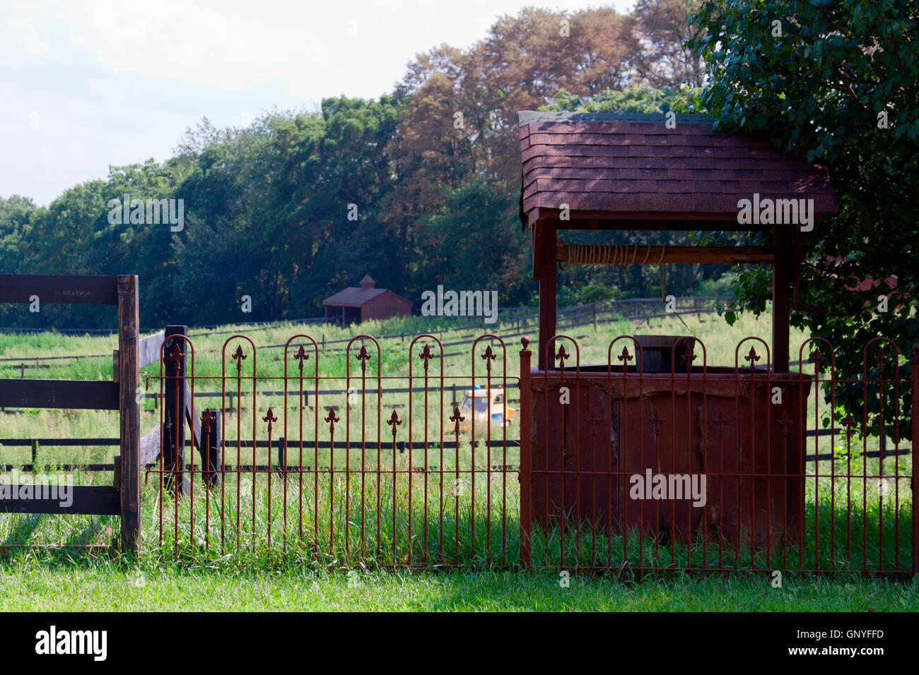 Antique wishing well on the farm Stock Photo Alamy