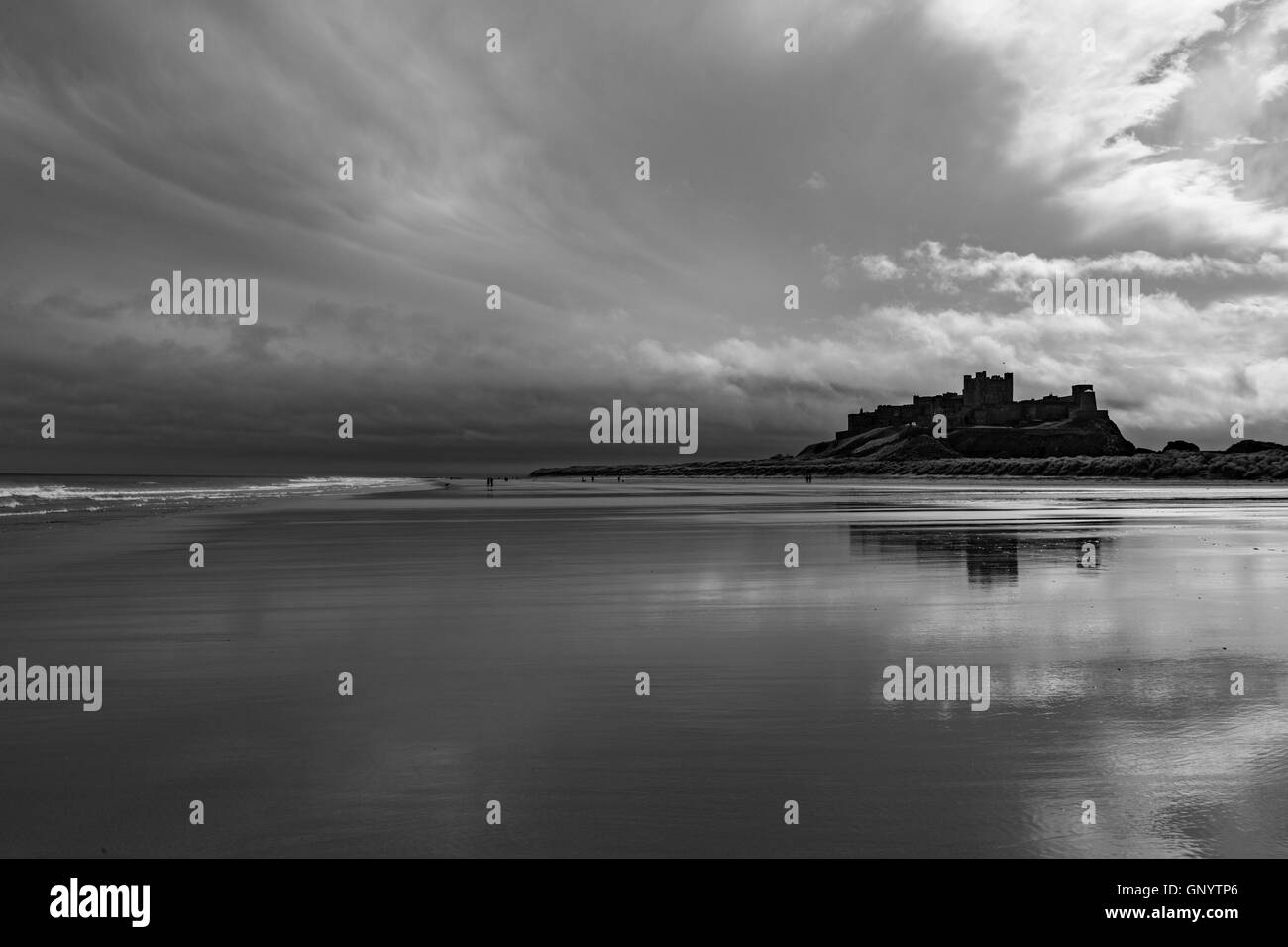 Bamburgh Castle in monochrome, Northumberland Coast, England, UK Stock Photo