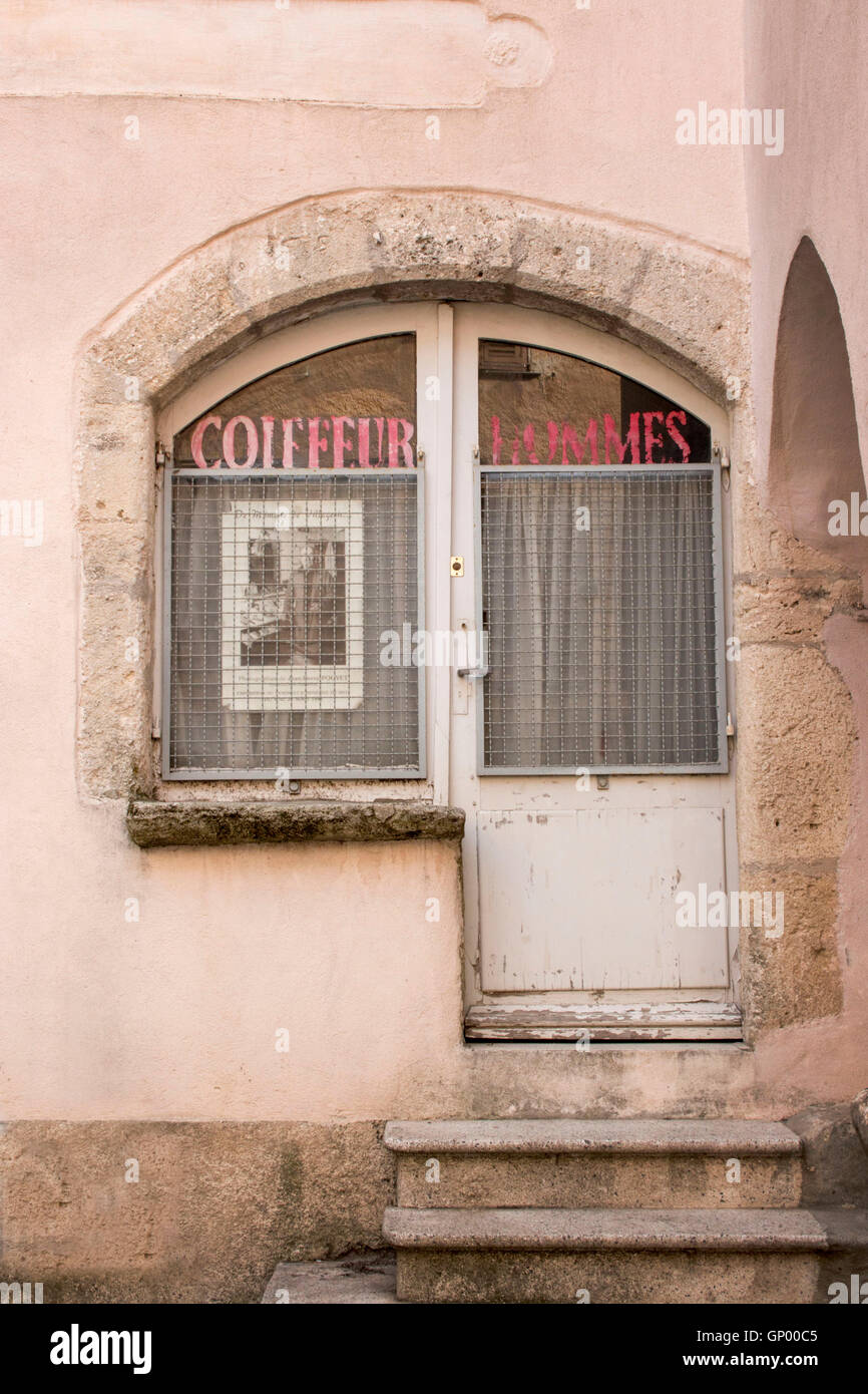 Old hairdressers coiffure shop in small French village Stock Photo
