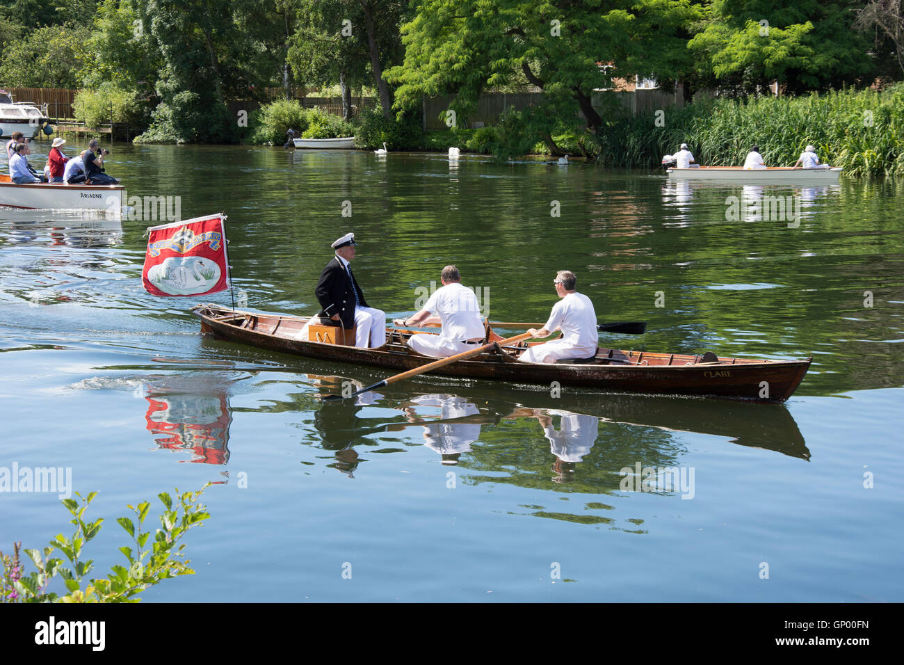Swan Upping boat and skiff on Thames River at Lalham Reach, Laleham, Surrey, England, United Kingdom Stock Photo