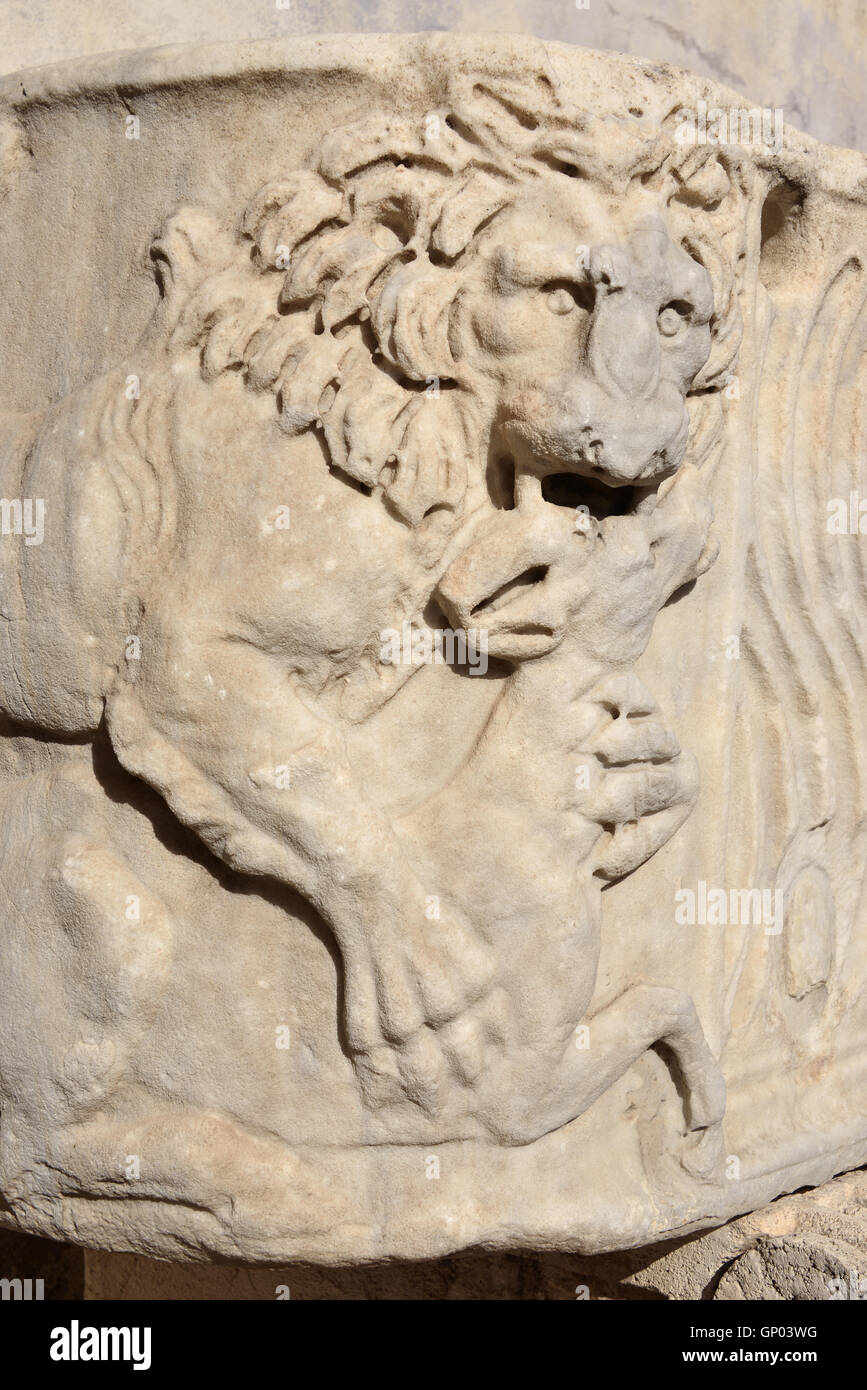 Relief of lion kills an antelope from an ancient roman sarcophagus replica, in Villa Borghese public park, Rome Stock Photo