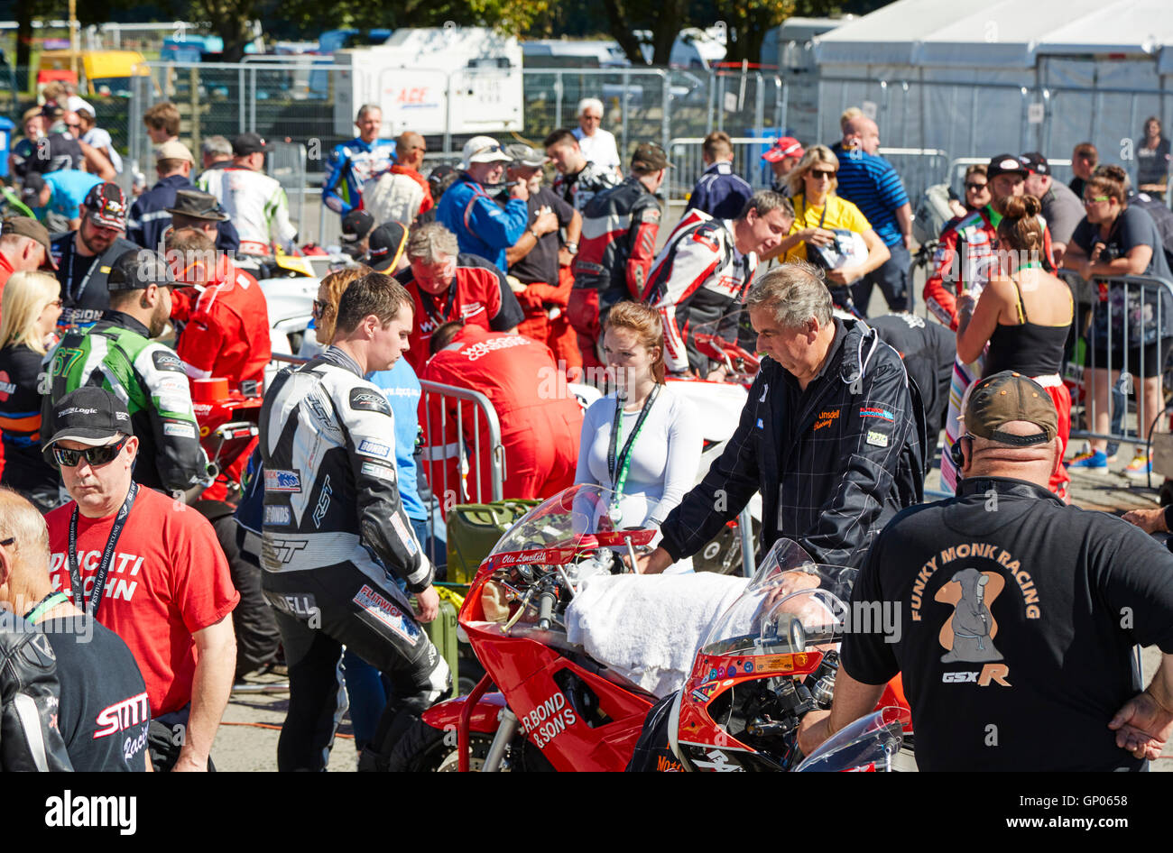 Competitors at the paddock area before the Superbike Classic TT race, Festival of Motorcycling 2016 Stock Photo