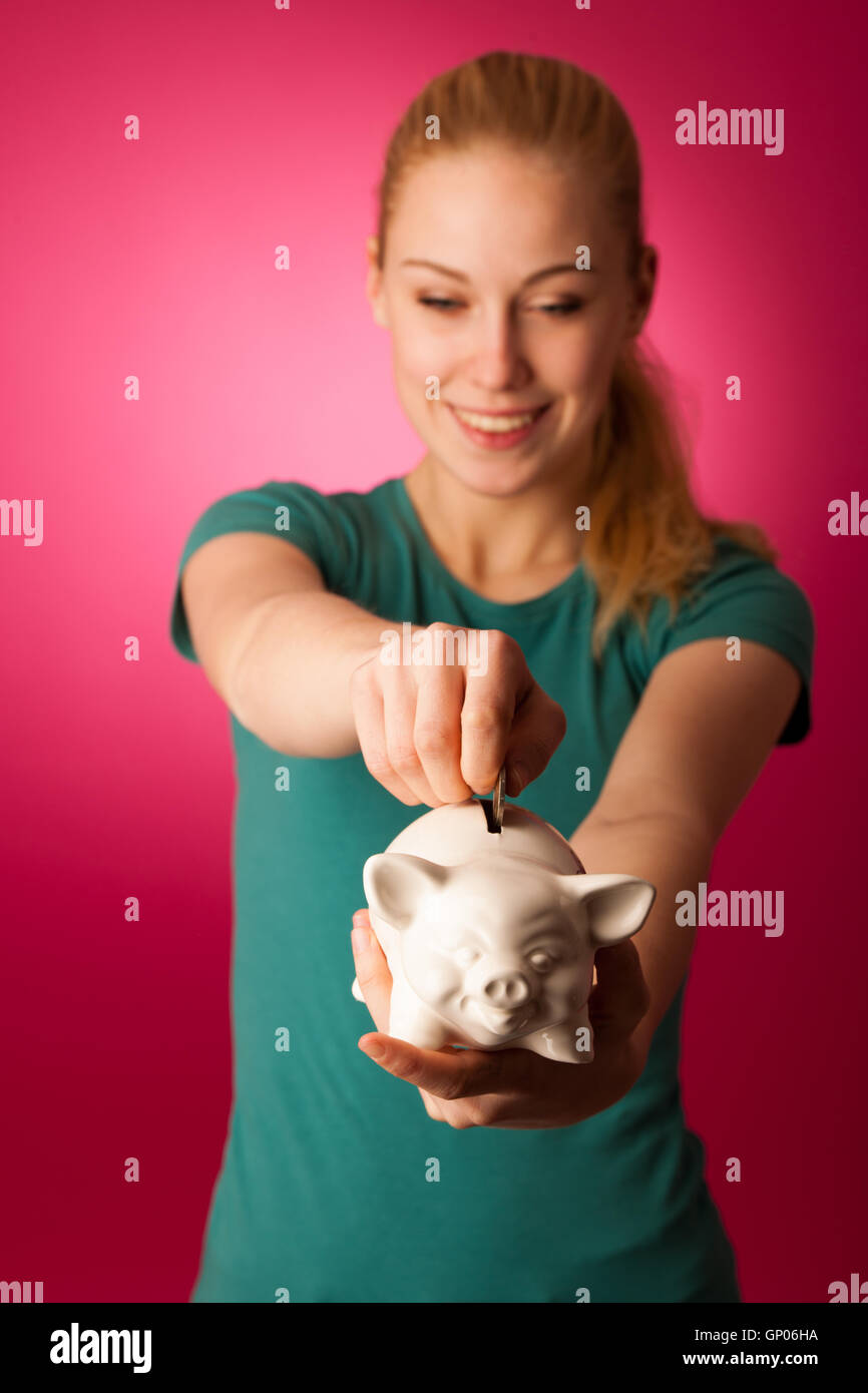 Woman with piggy bank in hands excited to safe save savings Stock Photo ...
