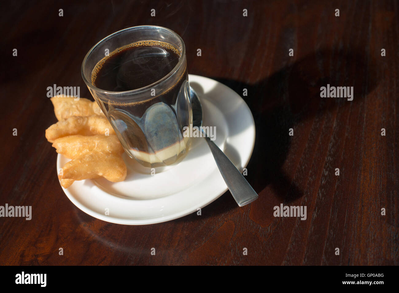 Thai tradition hot coffee with sweetened condensed milk in old style