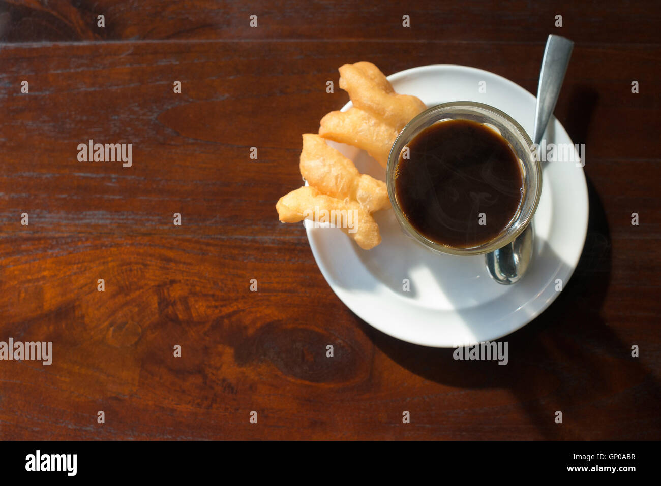 Thai tradition hot coffee with sweetened condensed milk in old style