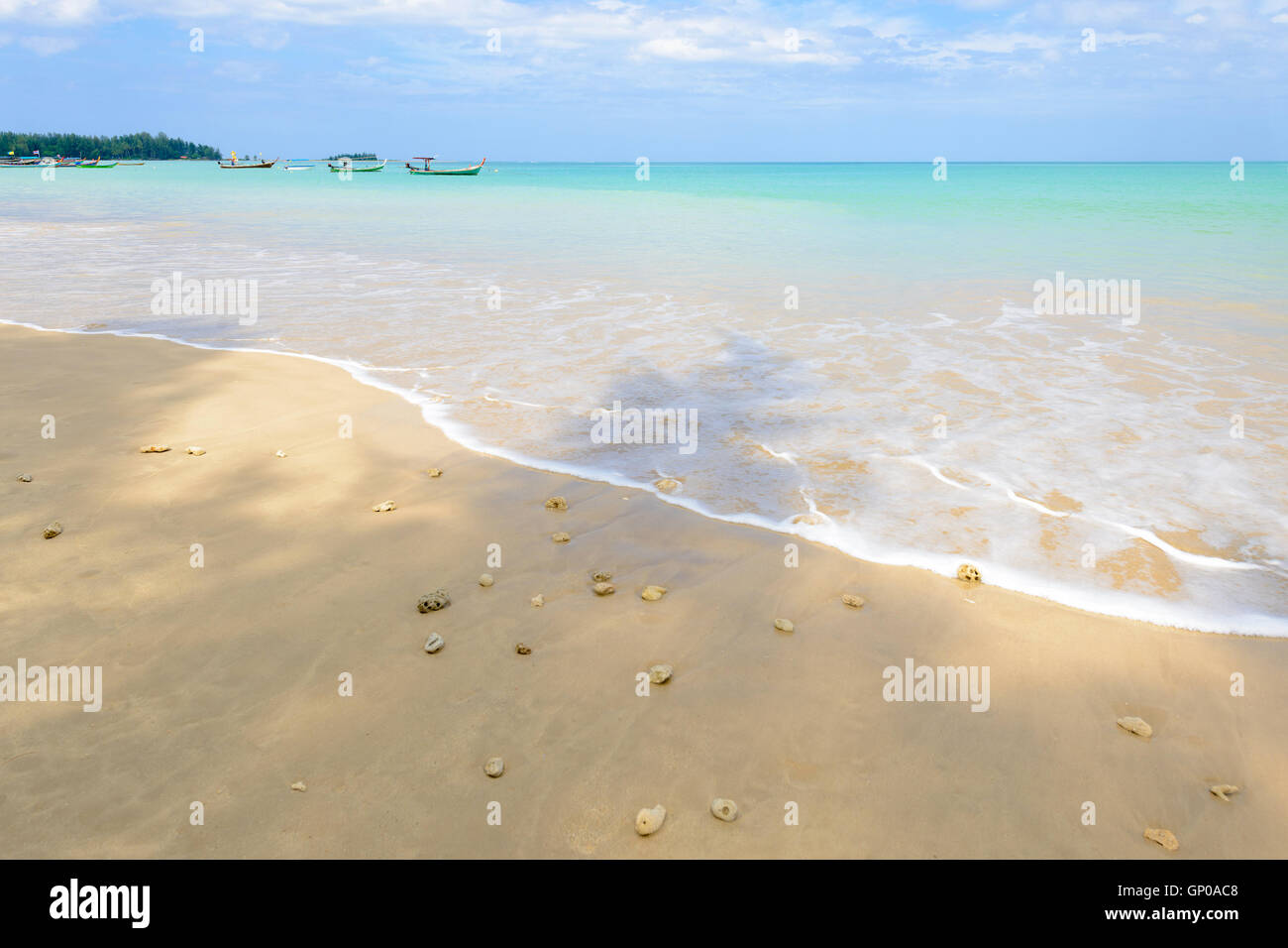 Tropical beach in Thailand, fishing boat. Stock Photo