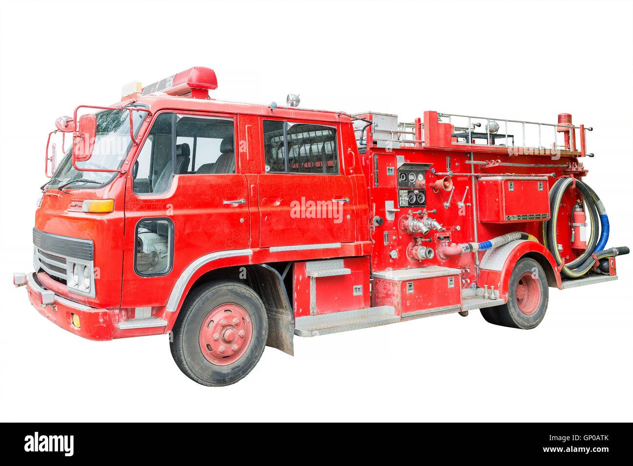 dirt old fire truck and close up equipments isolated on white. Stock Photo