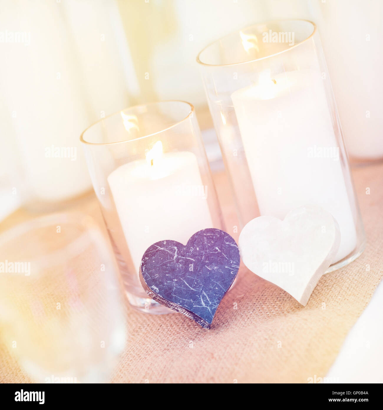 Colourful of decoration, candles, marble hearth shape, setting for celebration on dinner table setup. wedding sweetness decorati Stock Photo