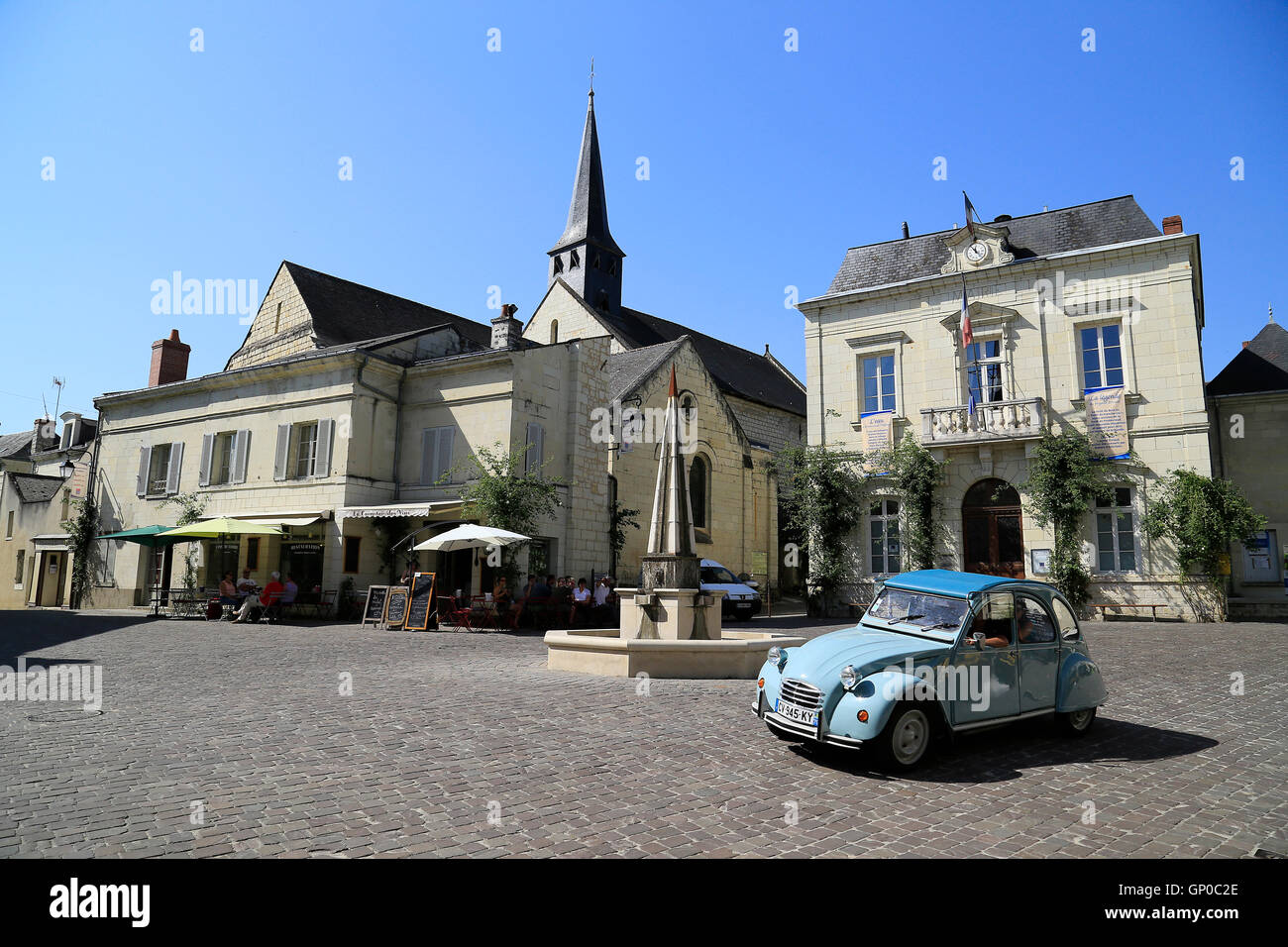 Citroen 2CV classic car in centre of pretty French village Stock Photo