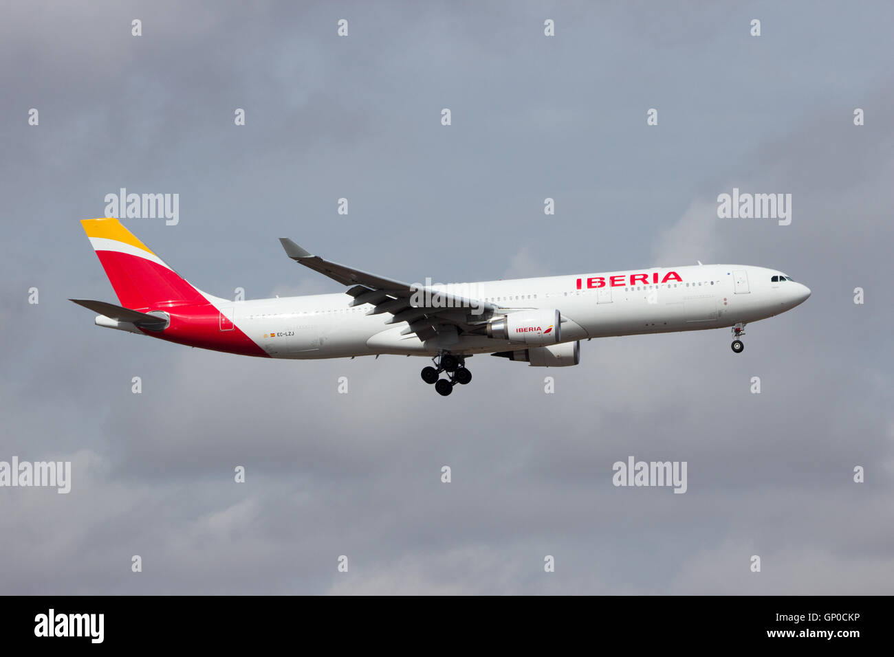 Iberia Airbus A330-300 flying over Torrejon Airport. Stock Photo