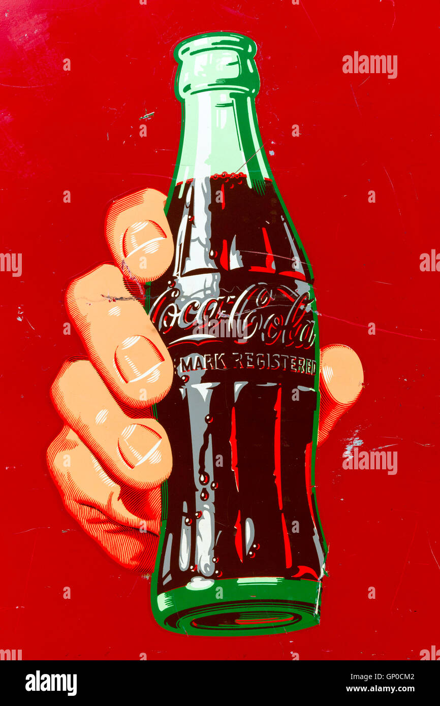 Coca Cola logo on a vintage Coke machine. Stock Photo