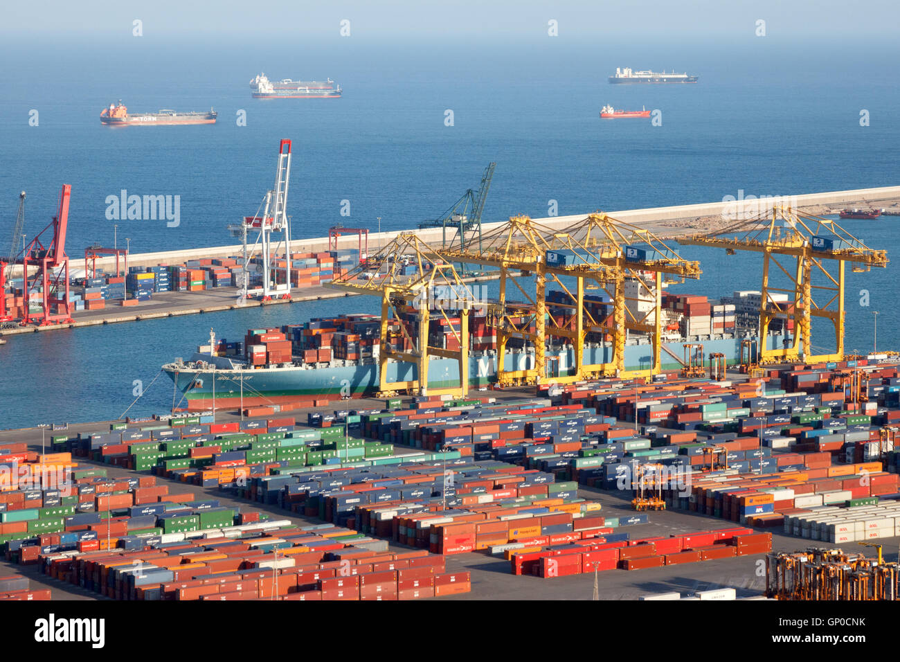 Ship being loaded in the container terminal from the Port of Barcelona. Stock Photo