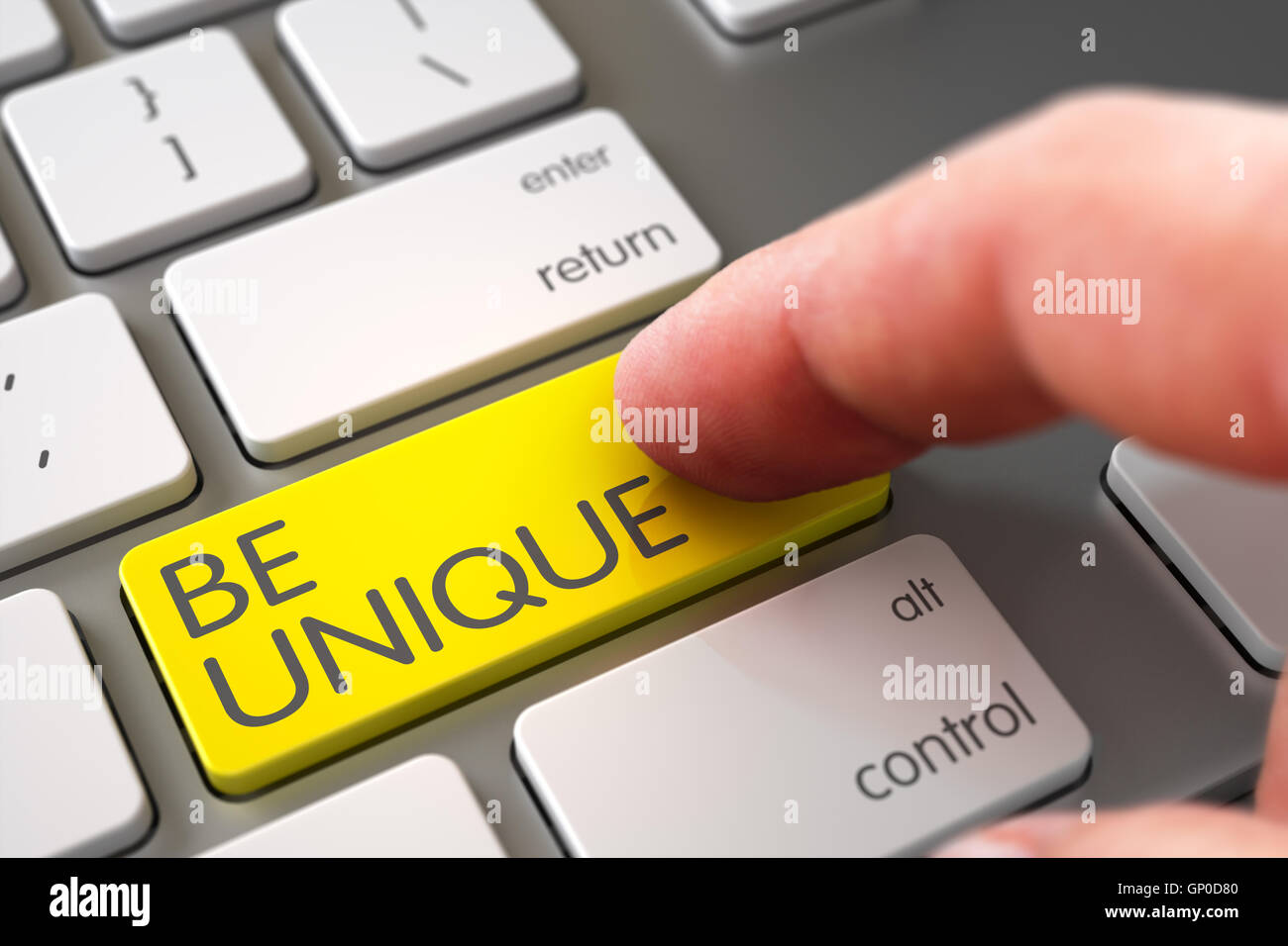 Finger Pushing Be Unique Yellow Button on Laptop Keyboard. 3D Illustration. Stock Photo