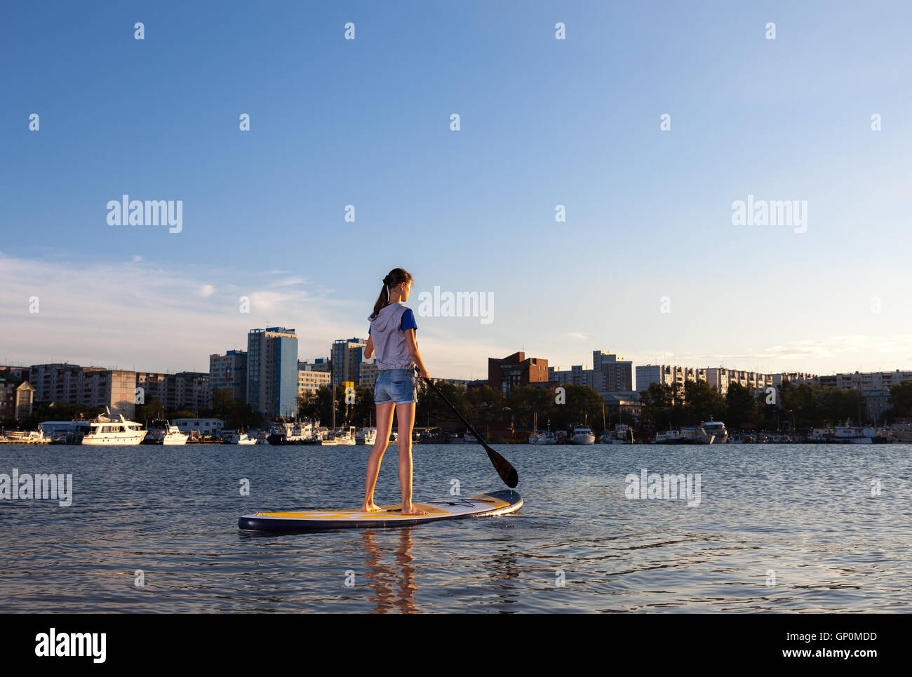 Beautiful woman on Stand Up Paddle Board. SUP Stock Photo Alamy