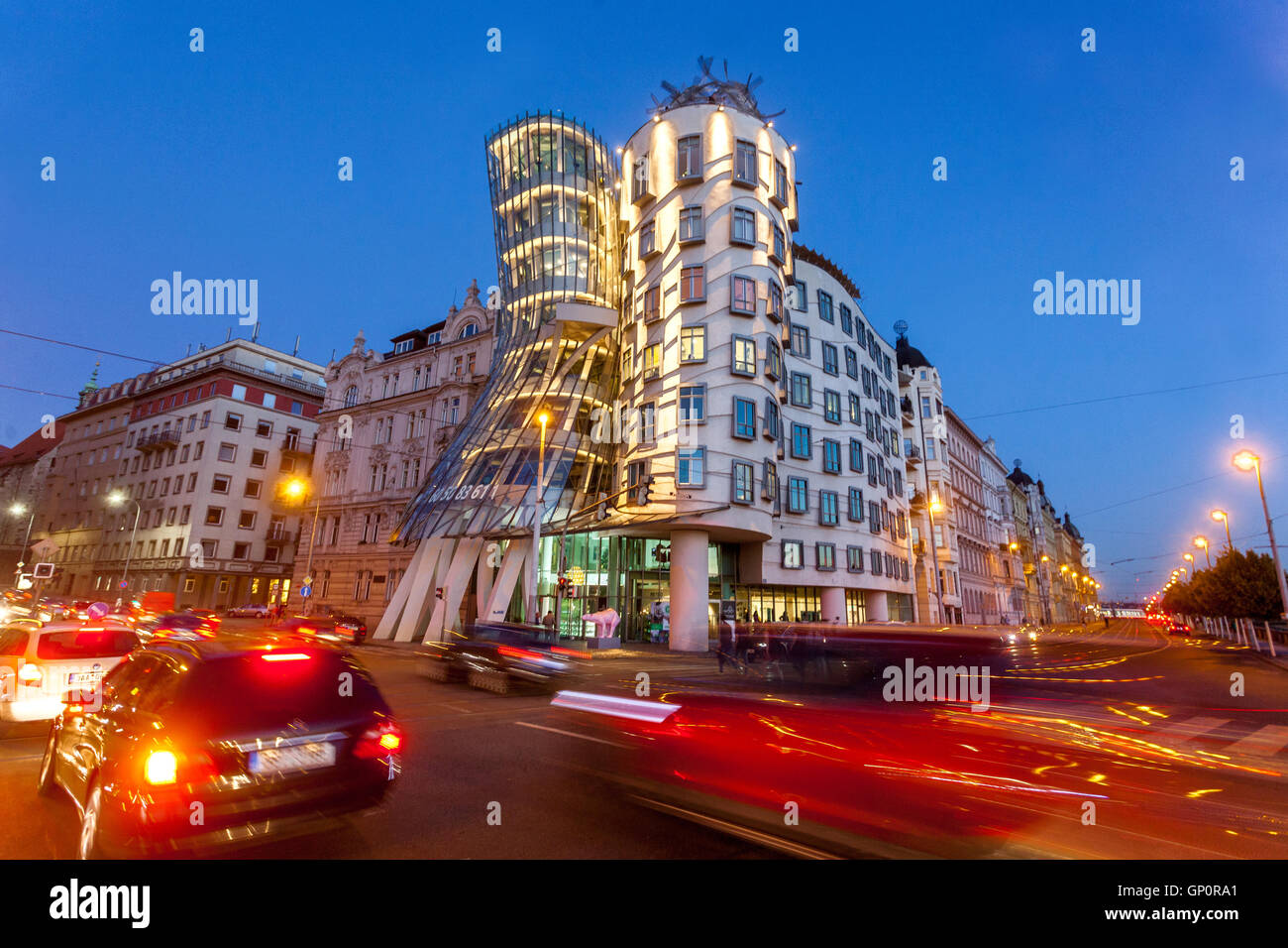 Building by Frank Gehry Dancing House Prague building facade Czech Republic night coming Prague blue hour Stock Photo