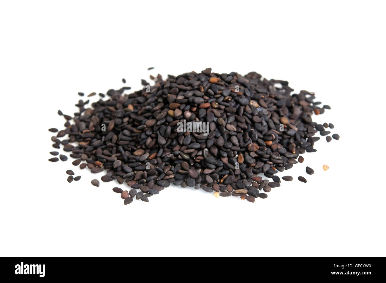 Black sesame seeds isolated on white (also called as Sesamum Indicum, Indicum sesame or Sesamon) Stock Photo
