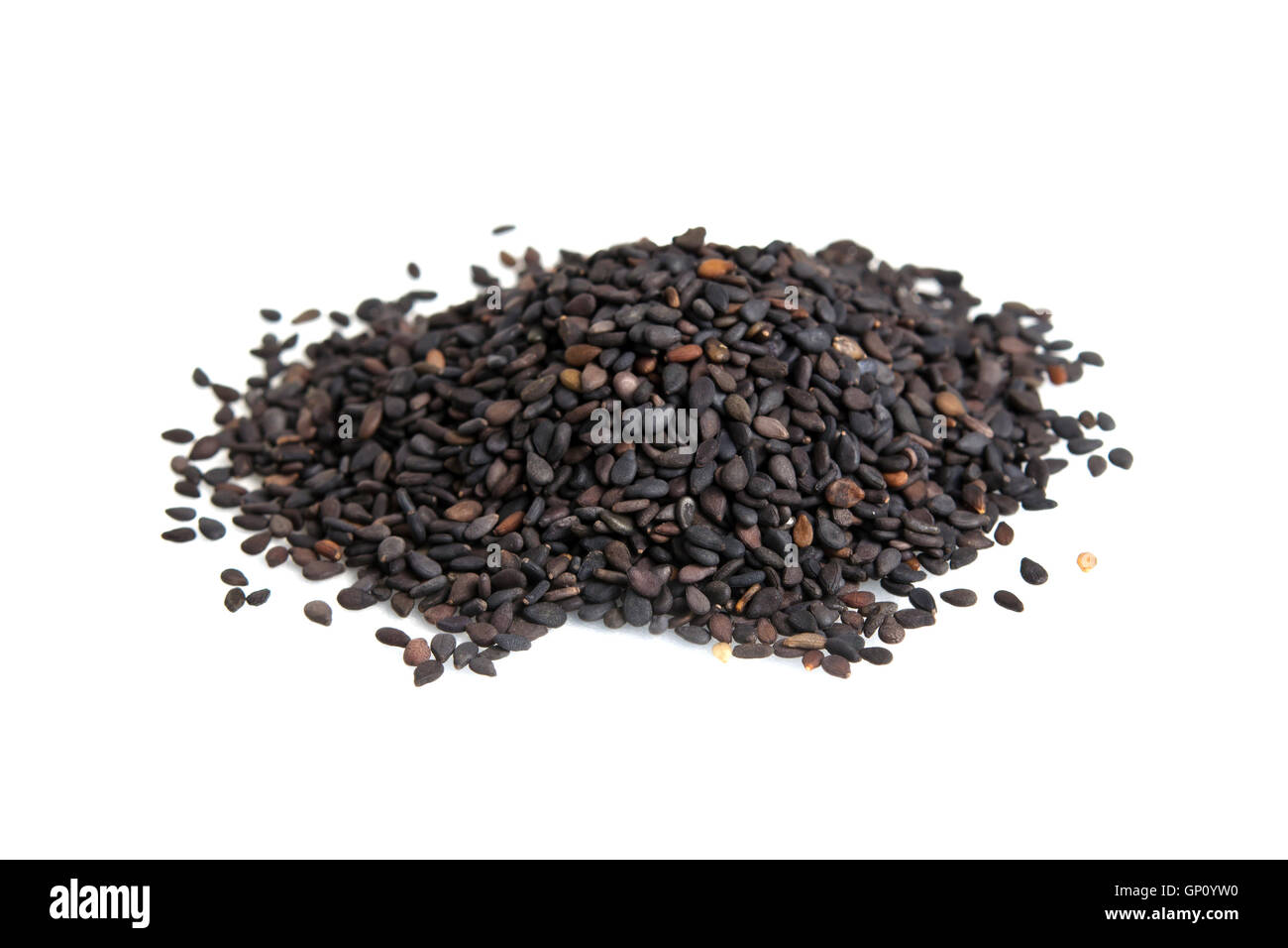 Black sesame seeds isolated on white (also called as Sesamum Indicum