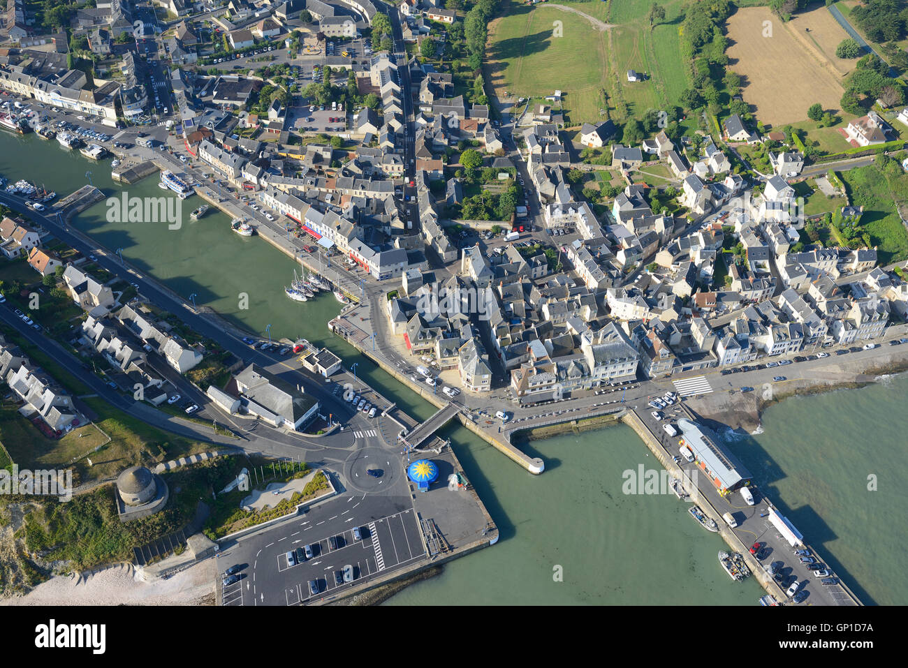 AERIAL VIEW. Seaside town of Port-en-Bessin-Huppain on the shores of the English Channel. Calvados, Normandie, France. Stock Photo