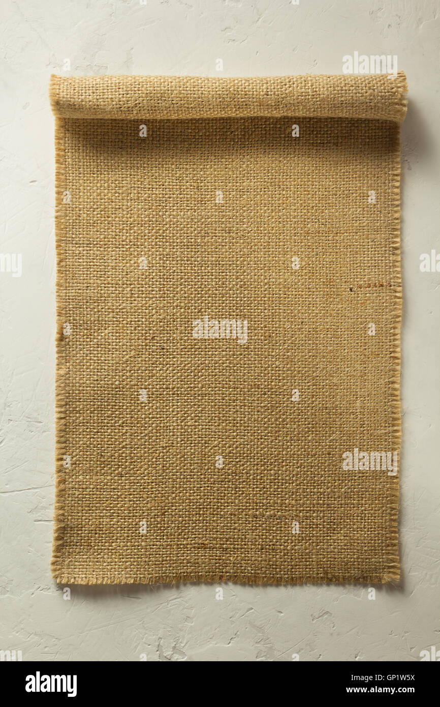 burlap hessian sacking on wall background Stock Photo - Alamy