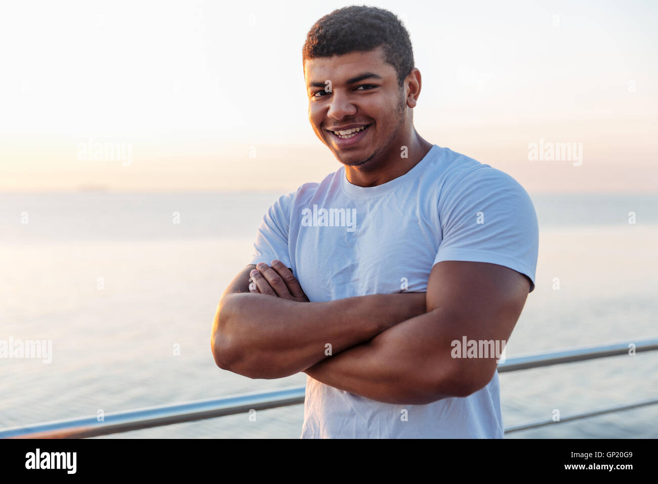 Arms crossed african sportsman hi-res stock photography and images - Alamy