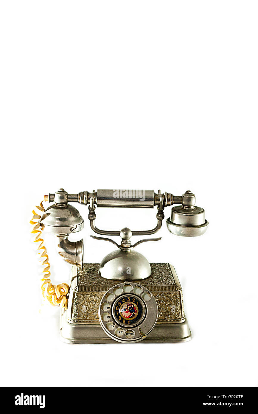 A beautiful vintage disc telephone in a white background Stock Photo