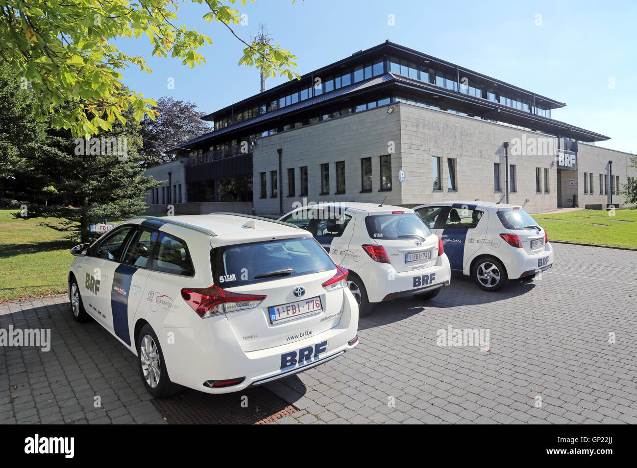 Cars and building of BRF (Belgian Broadcasting), the public broadcasting of the German-speaking Community in Eupen, Belgium Stock Photo